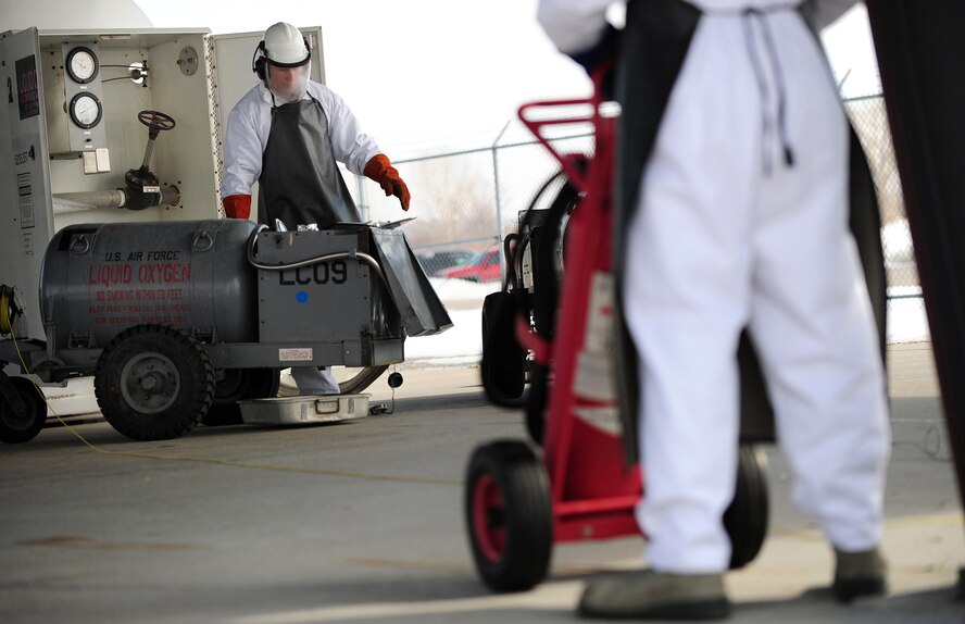OFFUTT AIR FORCE BASE, Neb. - Senior Airman Nicholas Simon, a fuels facilities technician with the 55th Maintenance Squadron's Fuels Management Flight, purges a hose attached to a liquid oxygen tank in order to remove impurities prior to filling a portable oxygen cart here March 2. U.S. Air Force photo by Josh Plueger