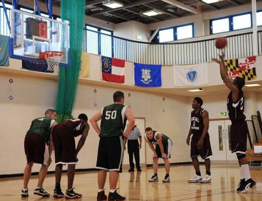 RAF MILDENHALL, England -- Lavarr Walker, RAF Mildenhall Team 1 player, takes a foul shot in the winding minutes of first-half play against RAF Lakenheath Team 2 in the 2010 U.S. Air Forces in Europe Small Unit/Intramural Basketball Championship game March 4 at the Hardstand Fitness Center. Teams from across Europe are playing in the three-day tournament for the championship title. RAF Mildenhall Team 1 beat RAF Lakenheath Team 2, 53-38 to open the brackets. (U.S. Air Force photo/Staff Sgt. Thomas Trower) 