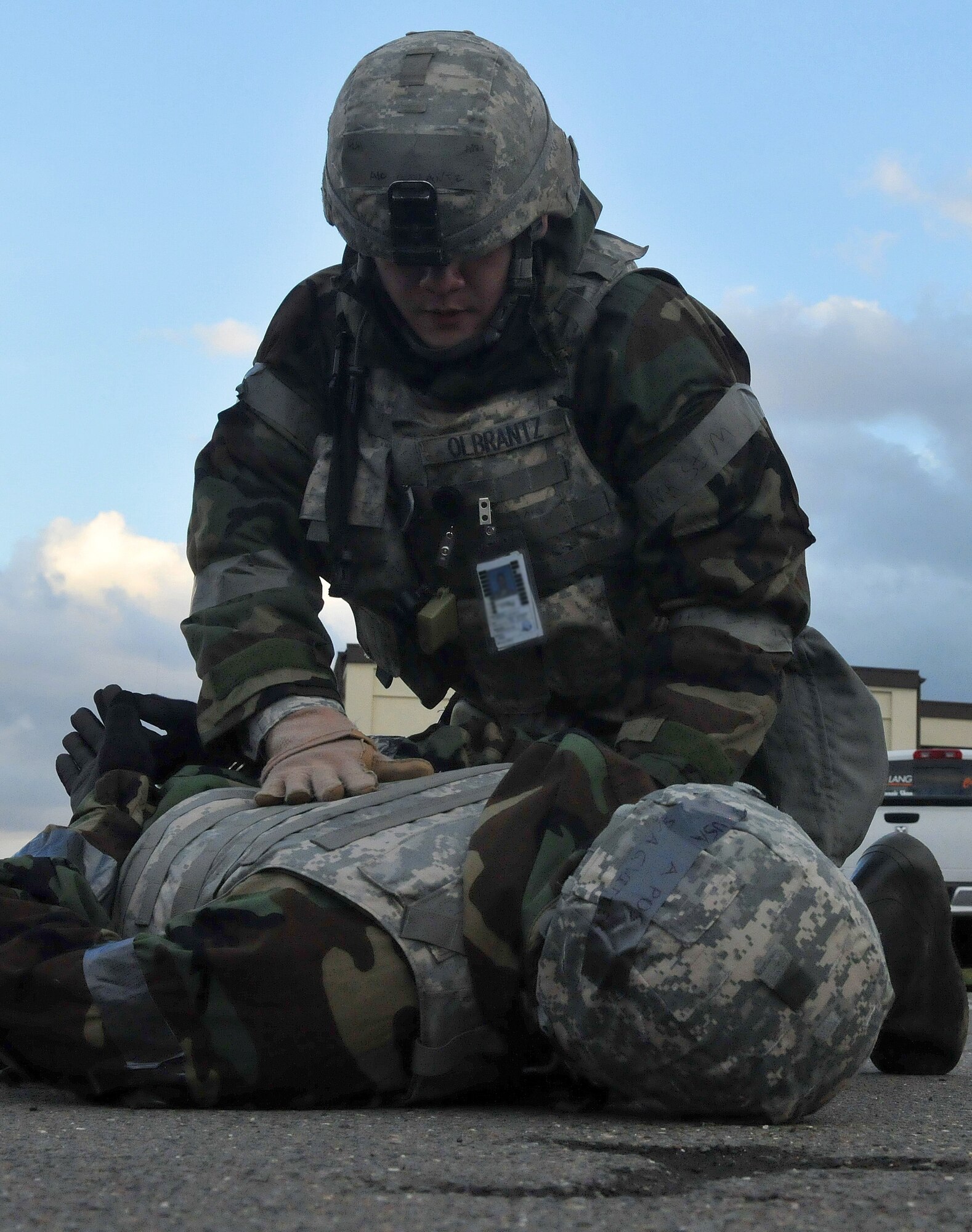 SPANGDAHLEM AIR BASE, Germany – Airman 1st Class Lenjie Olbrantz, 52nd Security Forces Squadron, arrests Senior Airman Geoffrey Witter, 52nd SFS, after Airman Witter simulated abandoning his post during Operation Saber Crown 10-04 here March 1. Airman Witter was instructed by members of the Exercise Evaluation Team to abandon his post to test the other security forces members. Members of the 52nd Fighter Wing participated in the Phase II exercise to evaluate the wing’s ability to survive and operate in a chemical, biological, radiological, nuclear and explosive environment. (U.S. Air Force photo/Airman 1st Class Nick Wilson)
