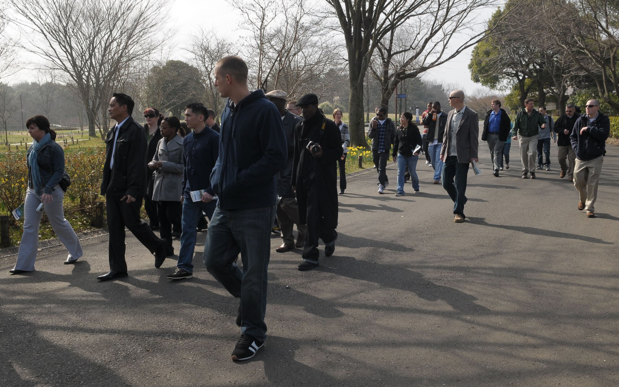TACHIKAWA, Japan -- Members from Yokota Air Base take a tour Mar. 3 during a tour through the Japanese Garden at Showa Kinen Park. Park managers hosted the group of military and civilian residents of Yokota, to help them experience authentic Japanese culture. The Japanese government created Showa Park 1983 to commemorate the 50th anniversary of Emperor Showa's reign. (U.S. Air Force photo/Airman 1st Class Sean Martin)