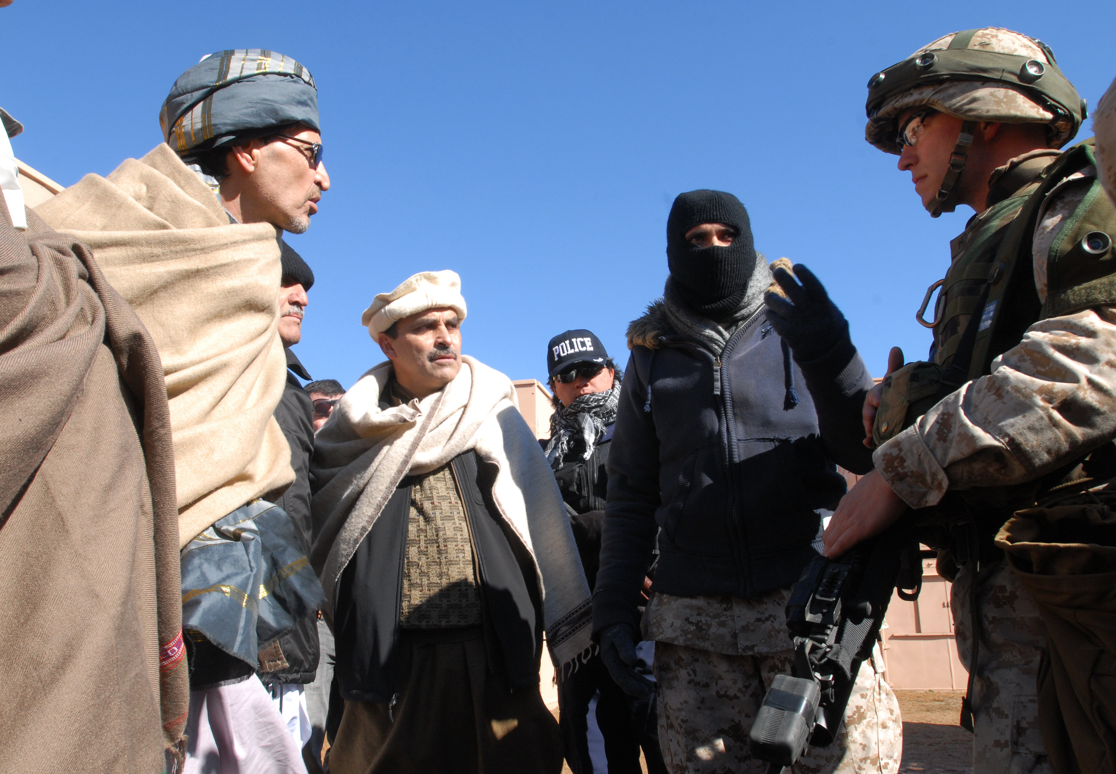 Afghan American Actors Posing As Villagers Converse With