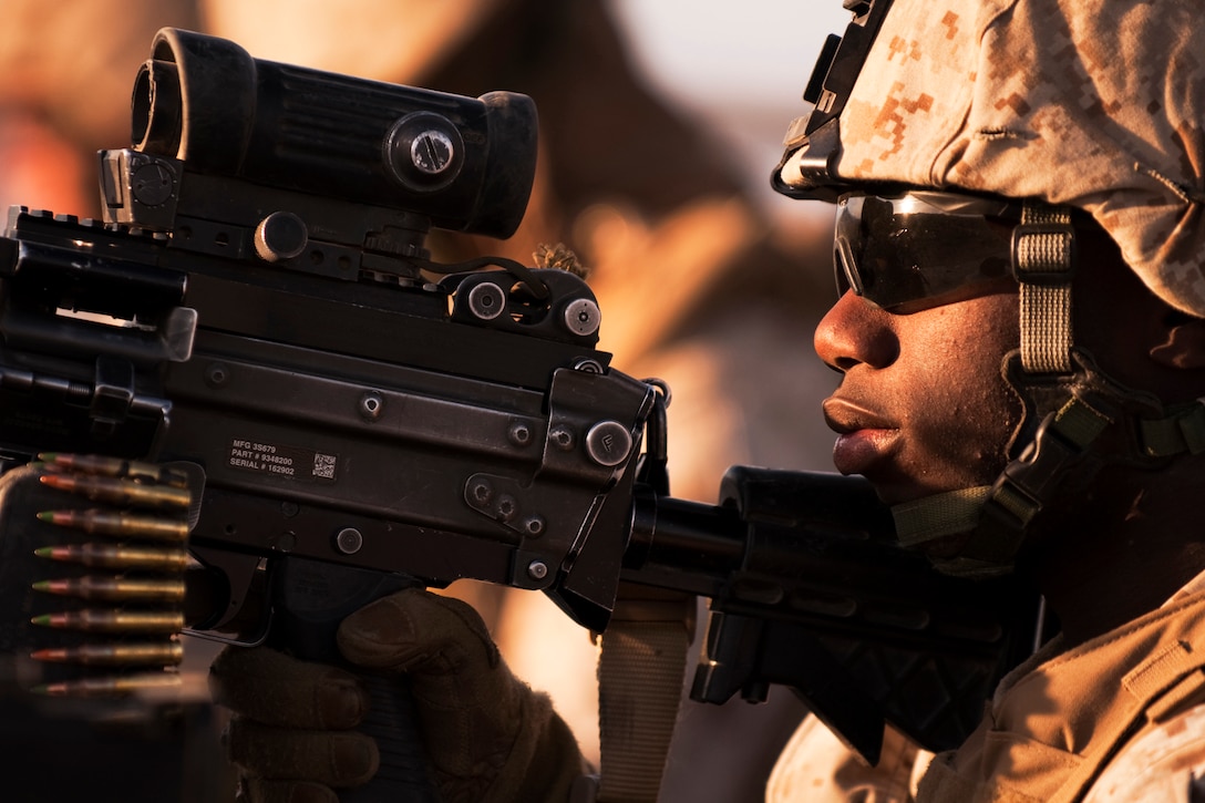 Lance Cpl. Evrod L. Jarrett, a point man with 1st Squad, 3rd Platoon, Kilo Company, 3rd Battalion, 3rd Marine Regiment, and native of Mount Vernon, N.Y., settles into a defensive position during the Clear, Hold, Build Exercise 2 at Range 210 at Marine Corps Air Ground Combat Center Twentynine Palms, Calif. March 5.