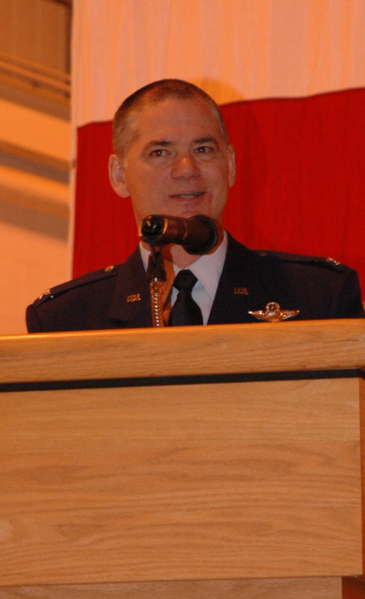 Col. Jay Pittman, Jr. addresses members of the 302nd Airlift Wing March 6 before the 302nd Maintnenace Group assumption of command ceremony at Peterson Air Force Base, Colo. Col. James Van Housen assumed command of the group in front of an audience of more than 120 people. Colonel Van Housen assumed command of the group after Col. Mark Rodriguez departed the 302nd MXG to become the maintenance liaison officer for 10th Air Force, based at Naval Air Station Joint Reserve Base Fort Worth, Texas. (U.S. Air Force photo/Staff Sgt. Stephen J. Collier)