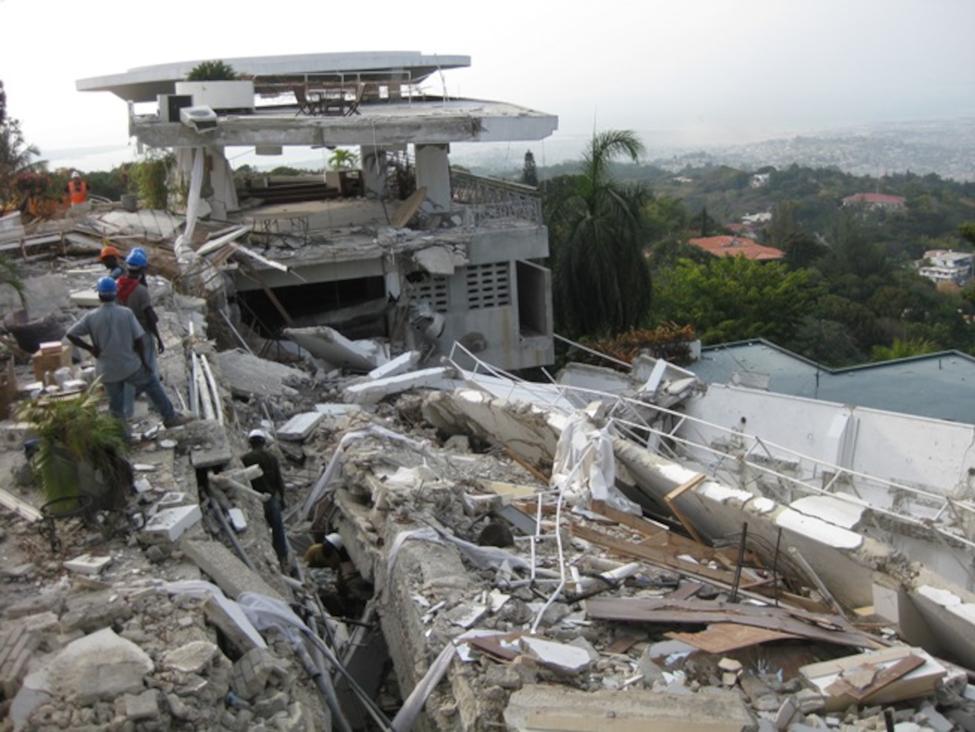 One of the buildings is seen that crumbled to piles of rock and debris after the devastating 7.0 earthquake hit on Jan. 12, 2010, in Haiti, taking the lives of more than 200,000 people. (Photo courtesy of TSgt. Bambi Putinas)
