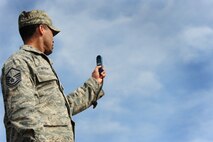 U.S. Air Force Master Sgt. Ronnie Wright, an independent duty medical technician, with the 435th Security Forces takes a wind speed reading at the drop zone of a multinational jump with French and U.S. paratroopers, March 2, 2010.  Members of the 435th Contingency Response Group and the 5th Quartermaster Company joined with their French military counterparts for a week of training at the École des troupes aéroportées (ETAP), or School of Airborne Troops, a military school dedicated to training the military paratroopers   of the French army, located in the town of Pau, in the département  of Pyrénées-Atlantiques , France.  The ETAP is responsible for training paratroopers, and for international cooperation and promotion of paratroop culture. (U.S. Air Force Photo by Staff Sgt. Jocelyn Rich)