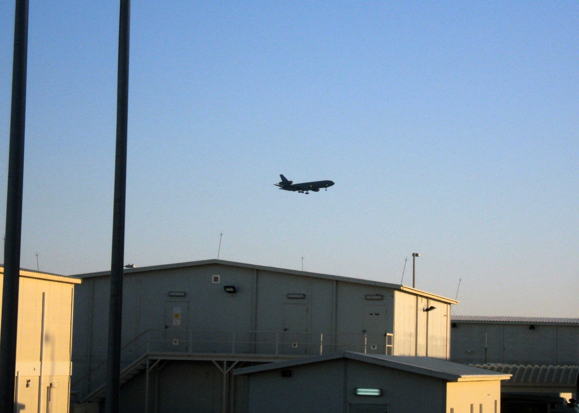 A KC-10 Extender from the 908th Expeditionary Air Refueling Squadron returns from a combat air refueling mission over the compound of the 380th Air Expeditionary Wing at a non-disclosed base in Southwest Asia on March 4, 2010. The 380th AEW supports operations Iraqi Freedom and Enduring Freedom and the Combined Joint Task Force-Horn of Africa. (U.S. Air Force Photo/Master Sgt. Scott T. Sturkol)