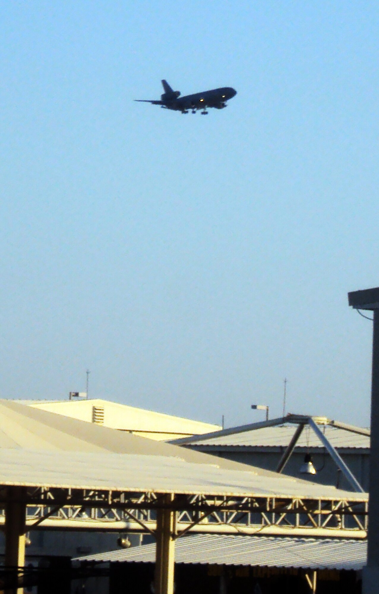 A KC-10 Extender from the 908th Expeditionary Air Refueling Squadron returns from a combat air refueling mission over the compound of the 380th Air Expeditionary Wing at a non-disclosed base in Southwest Asia on March 4, 2010. The 380th AEW supports operations Iraqi Freedom and Enduring Freedom and the Combined Joint Task Force-Horn of Africa. (U.S. Air Force Photo/Master Sgt. Scott T. Sturkol)