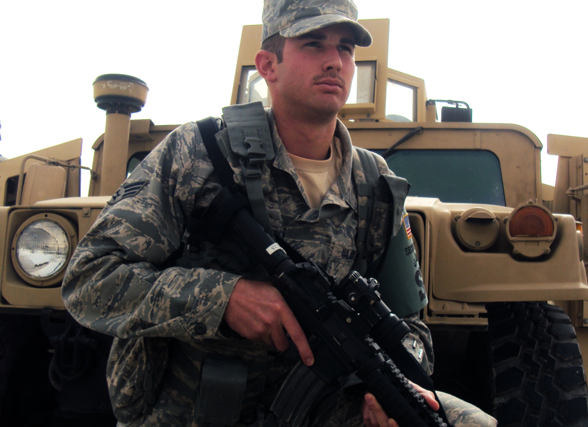 Senior Airman Nolan Spiers watches over a checkpoint near the encampment of the 380th Air Expeditionary Wing during operations at a non-disclosed base in Southwest Asia on March 6, 2010. Airman Spiers is security forces journeyman deployed with the 380th Expeditionary Security Forces Squadron who serves as a security response team member charged with security and force protection of more than 1,900 deployed personnel and billions of dollars worth of deployed assets, equipment and aircraft. He is deployed from the 96th Security Forces Squadron at Eglin Air Force Base, Fla., and his hometown is Pensacola, Fla. (U.S. Air Force Photo/Master Sgt. Scott T. Sturkol)