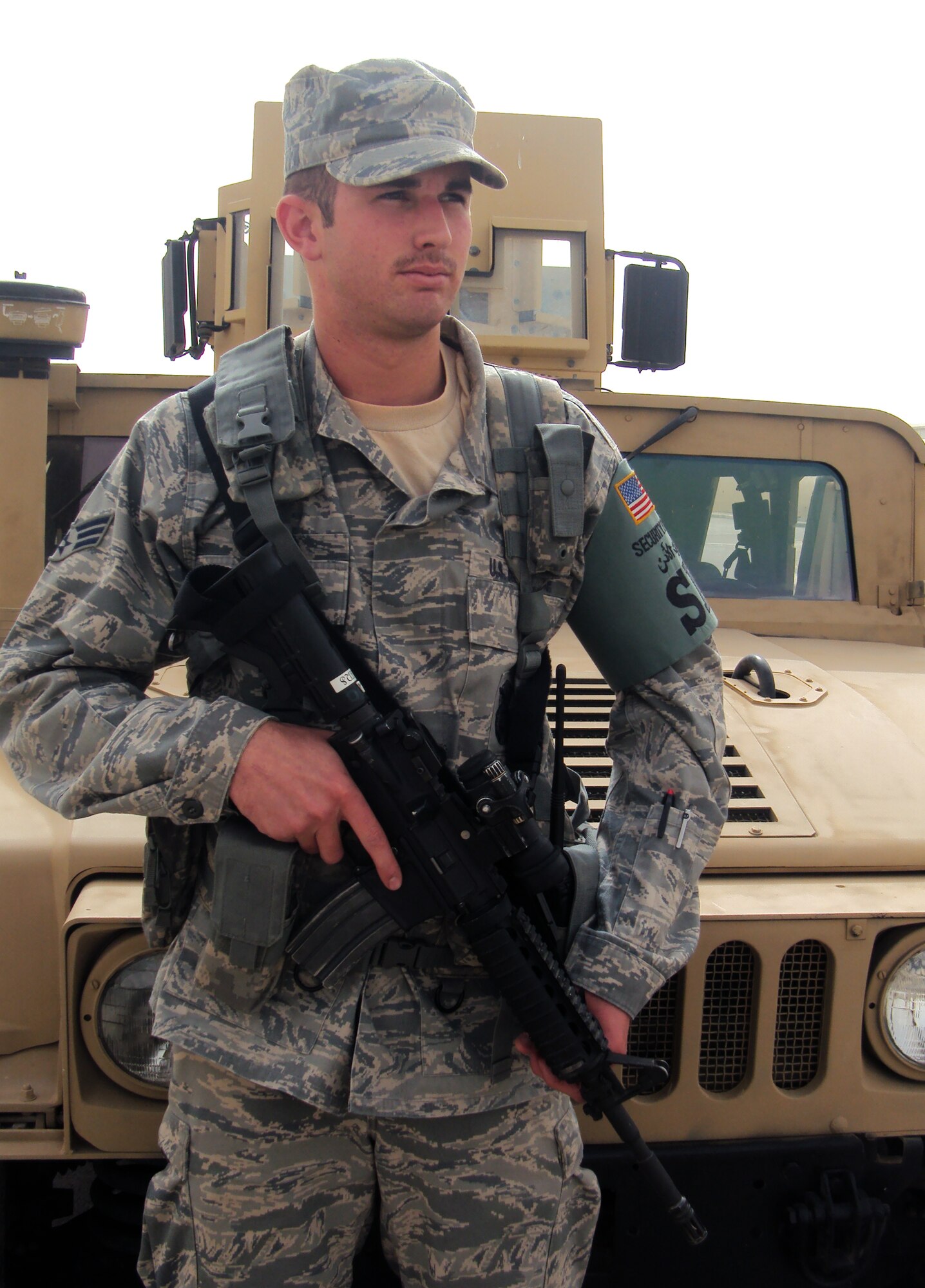 Senior Airman Nolan Spiers watches over a checkpoint near the encampment of the 380th Air Expeditionary Wing during operations at a non-disclosed base in Southwest Asia on March 6, 2010. Airman Spiers is security forces journeyman deployed with the 380th Expeditionary Security Forces Squadron who serves as a security response team member charged with security and force protection of more than 1,900 deployed personnel and billions of dollars worth of deployed assets, equipment and aircraft. He is deployed from the 96th Security Forces Squadron at Eglin Air Force Base, Fla., and his hometown is Pensacola, Fla. (U.S. Air Force Photo/Master Sgt. Scott T. Sturkol)
