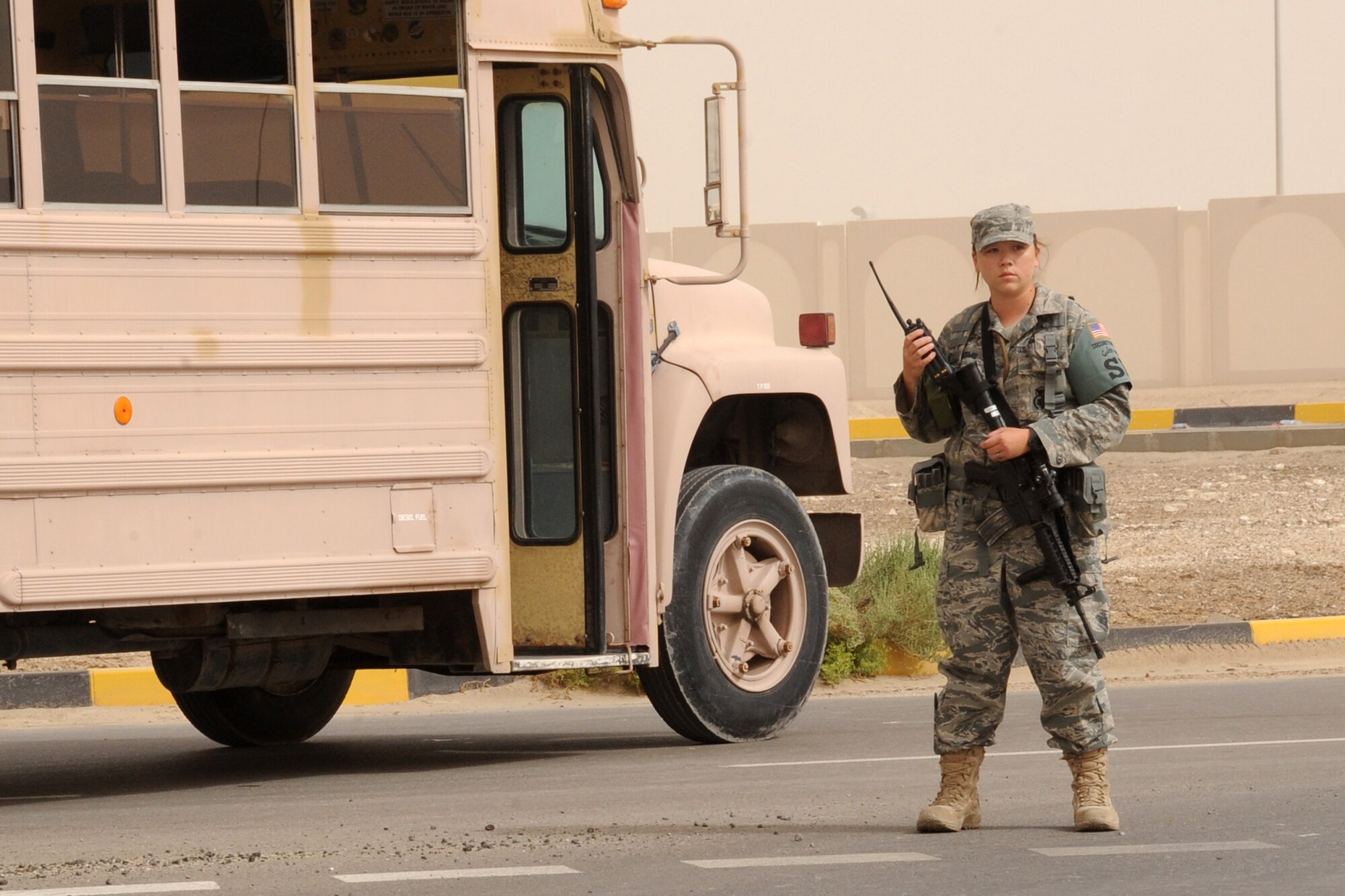 Airman 1st Class Robin Holcomb, 380th Expeditionary Security Forces member, participates in the major accident response exercise at an undisclosed location in Southwest Aisa on March 6, 2010. Members of the 380th Air Expedionary Wing participated in the exercise to test readiness and response to major accidents. The 380th AEW, supports Operations Iraqi Freedom and Enduring Freedom and the Combined Joint Task Force-Horn of Africa. The 380th AEW is comprised of four groups and 12 squadrons and the wing's deployed mission includes air refueling, surveillance and reconnaissance in support of overseas contingency operations in Southwest Asia. (U.S. Air Force photo/Senior Airman Jenifer H. Calhoun/Released)
