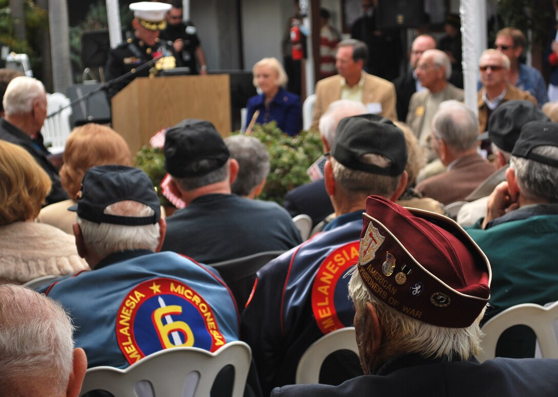 Col. Nicholas Marano, commanding officer, Marine Corps Base Camp Pendleton speaks to residents and veterans of San Clamente, Calif., at the city’s historical Casa Romantica, March 6. The event was held to honor World War II veterans and officially open the “Memories of World War II” exhibit, a display of Associated Press photos and memorabilia from the era.