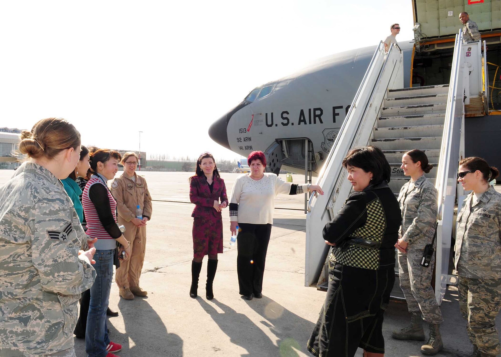 Female KC-135 aircrew from the Transit Center at Manas, Kyrgyzstan, show female students from the Kyrgyz Law Academy the Stratotanker on the flight line here March 6, 2010. The Kyrgyz Law Academy sent several of their female students to the installation, where many female Airmen briefed them on the operations here. This was planned in honor of Women’s Day, a national Kyrgyz holiday. (U.S. Air Force photo/Staff Sgt. Carolyn Viss/released)