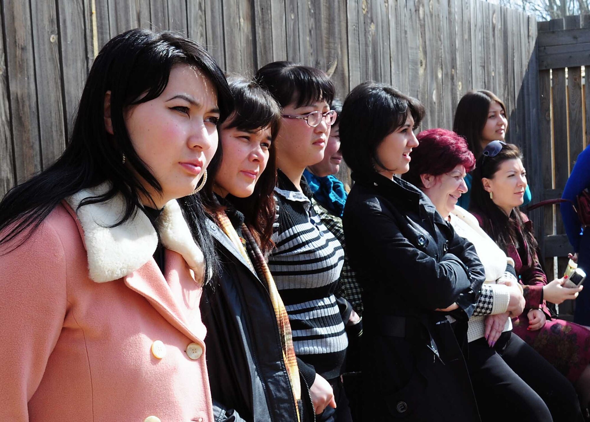 Female students from the Kyrgyz Law Academy watch a military working dog demonstration during a tour of the Transit Center at Manas, Kyrgyzstan, March 6, 2010. The Kyrgyz Law Academy sent several of their female students to the installation, where many female Airmen briefed them on the operations here. This was planned in honor of Women’s Day, a national Kyrgyz holiday, which occurs March 8. (U.S. Air Force photo/Staff Sgt. Carolyn Viss/released)