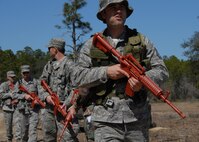 Tech. Sgt. John Glenister, 919th Security Forces Squadron, takes point at the start of his squad's force-on-force training scenario at Duke Field March 6.  The scenario was part of a Field Training Exercise for the 919th SFS during the UTA weekend.  Squads also participated in tent building, land navigation, self-aid and buddy care and prisoner search.  (U.S. Air Force photo/Tech. Sgt. Samuel King Jr.)