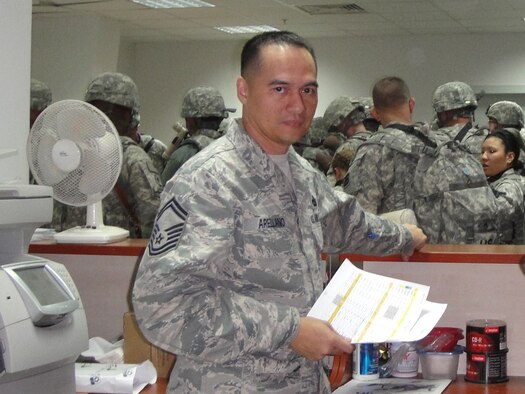 Congratulations to Senior Master Sgt. Robert J. Arellano for being selected as the 332nd Expeditionary Logistics Readiness Squadron, Balad Air Base, Iraq, Tuskegee Airman of the Month, Jan. 15-Feb. 15, Senior Noncommissioned Officer Category. His accomplishments include moving a record 31,000 passengers for 1,500 missions with zero safety mishaps and a 98 percent reliability rate. Sergeant Arellano is deployed from the 44th Aerial Port Squadron, Guam. (Courtesy photo)