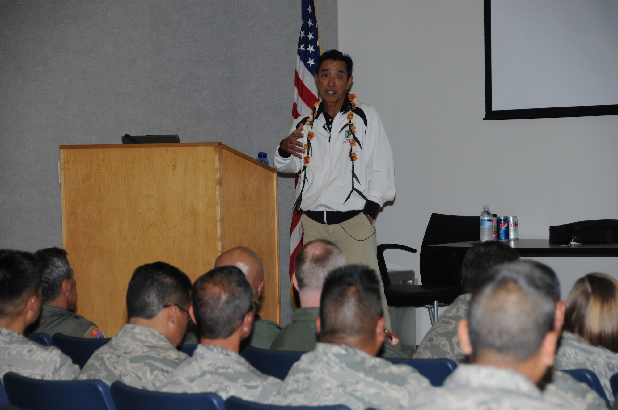 UH volleyball coach, Dave Shoji speaks to members of the 204th Airlift
Squadron Feb 3, 2010.(U.S. Air Force photo/Master Sgt. Kristen Stanley.)