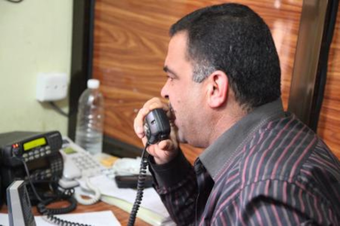 An Iraqi police dispatcher monitors a radio during the elections in Dhi Qar province, Iraq, March 7, 2010. The Marines with Military Transition Team 0130, assisted the Iraqi police and army with security for the elections in Mosul, Iraq. (U.S. Army photo by Spc. Robert Sheets)