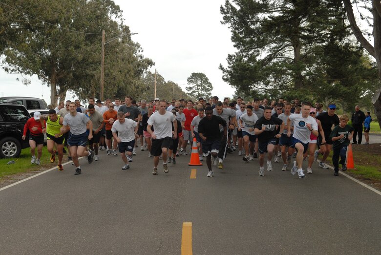 VANDENBERG AIR FORCE BASE, Calif. - - Kicking off the start of the Guardian Challenge 5K Run, the participants start the race here Friday, March 5, 2010. The run started and finished at Cocheo Park here and was followed up by a barbecue hosted by the Noncommissioned Officers Association. (U.S. Air Force photo/Airman 1st Class Angelina Drake)