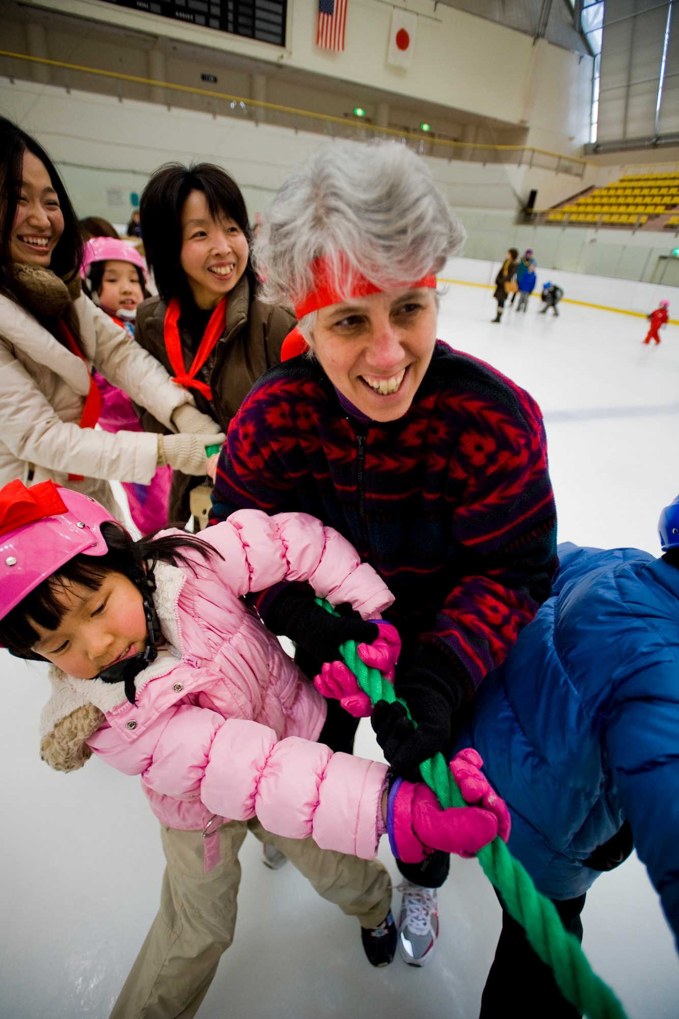 MISAWA CITY, Japan -- Children and adults of the community participate in a tug-of-war during the 11th annual International Ice Festival March 6 at the Misawa Ice Arena. With events that included bowling, relay racing and sledding, children were encouraged to have fun and make new friends. (U.S. Air Force photo/Senior Airman Jamal D. Sutter)