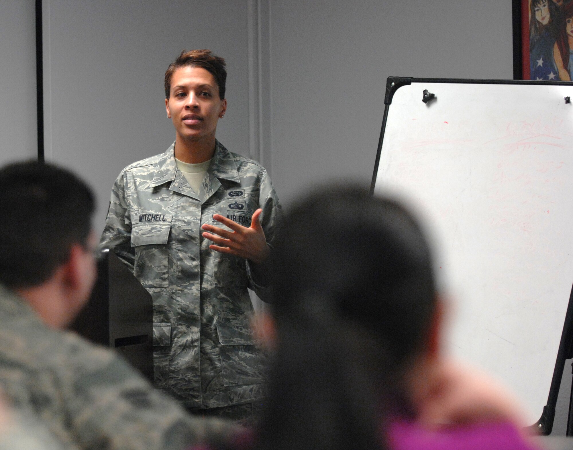 MINOT AIR FORCE BASE, N.D. -- Staff Sgt. Milette Mitchell, noncommissioned officer-in-charge of the Minot Air Force Base Equal Opportunity office, holds an equal opportunity class during a newcomer’s orientation Mar. 4.  The mission of the EO program is to improve mission effectiveness by promoting an environment free from unlawful discrimination and sexual harassment.  (U.S. Air Force photo by Airman 1st class Aaron-Forrest Wainwright)