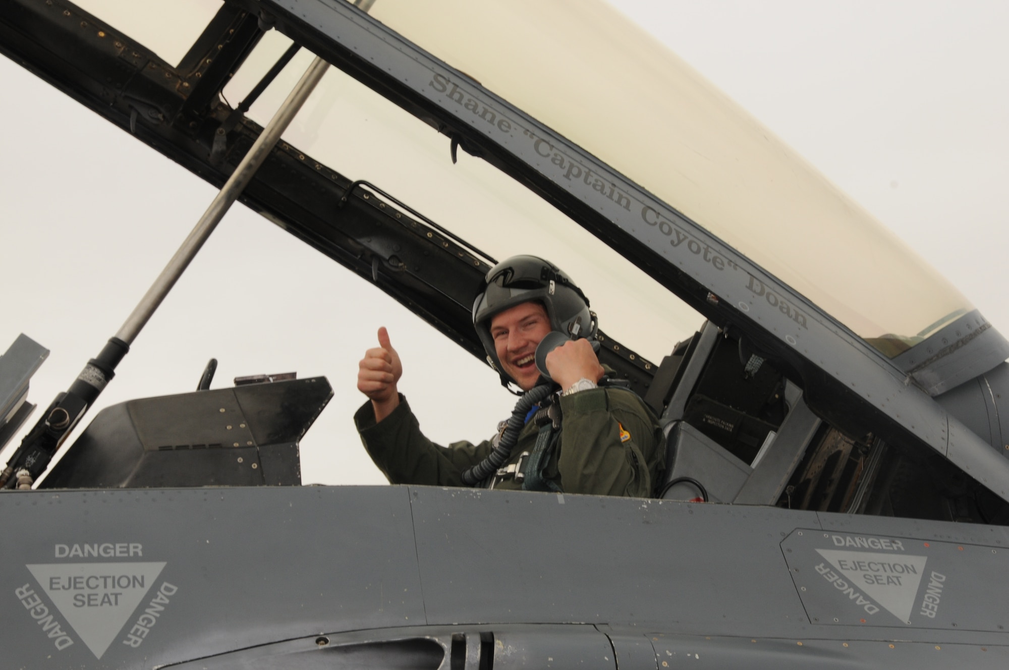 Shane Doan, Phoenix Coyotes team captain, gives a thumbs-up before his F-16 flight Feb. 26 with the 62nd Fighter Squadron. Mr. Doan and Tyson Nash, television color analyst, took to the skies over Luke and saw first-hand the capabilities of the Fighting Falcon. (U.S. Air Force photo by Tech. Sgt. Susan Stout)
