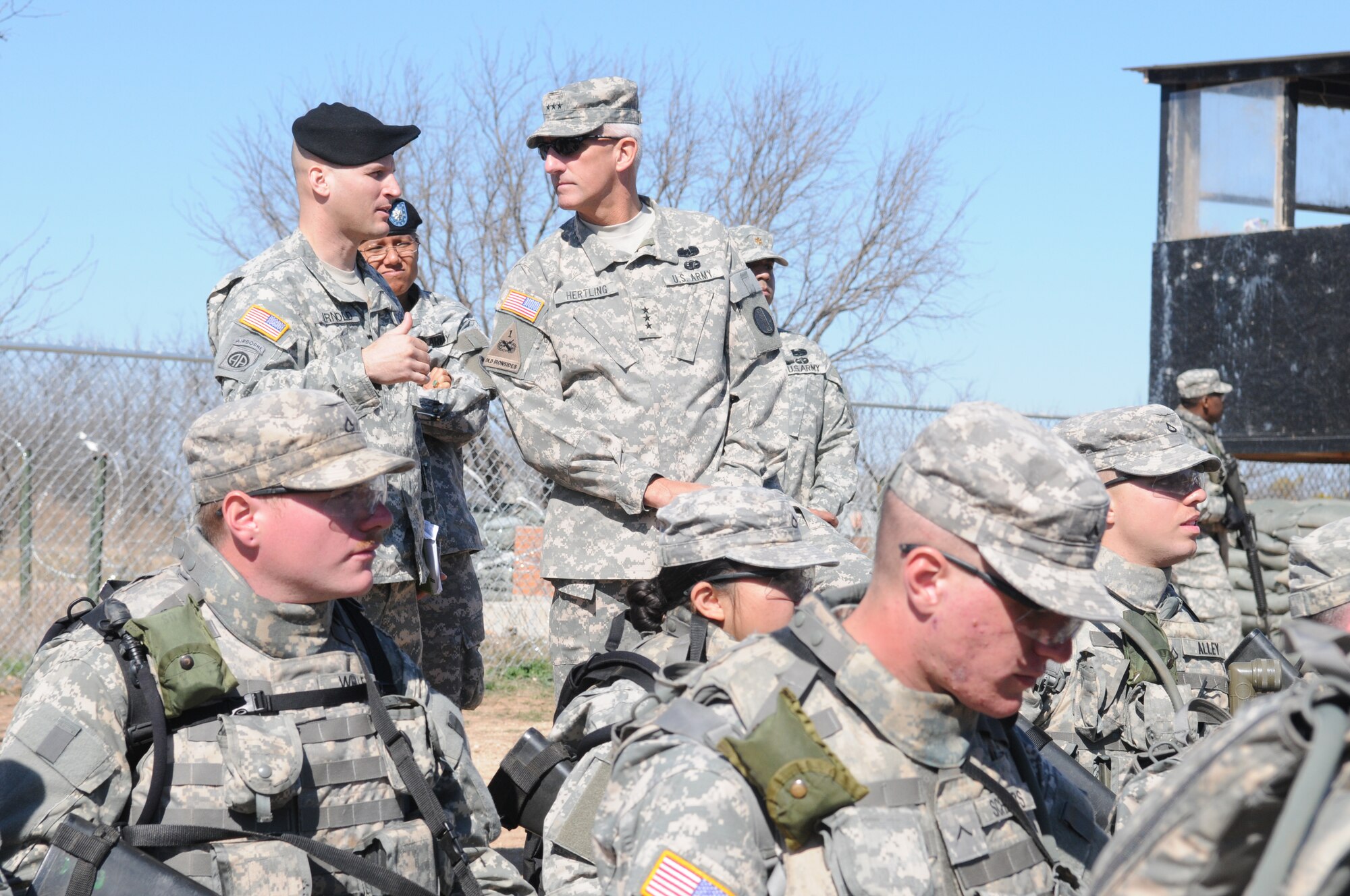 GOODFELLOW AIR FORCE BASE, Texas -- Lt. Gen. Mark Hertling speaks with Maj. James Arnold, 344th Military Intelligence Battalion, while visiting Forward Operating Base Sentinel, March 4, 2010. General Hertling, Deputy Commanding General for Initial Military Training, U.S. Army Training and Doctrine Command, visited Goodfellow to observe training. (U.S. Air Force photo/Airman 1st Class Clayton Lenhardt)