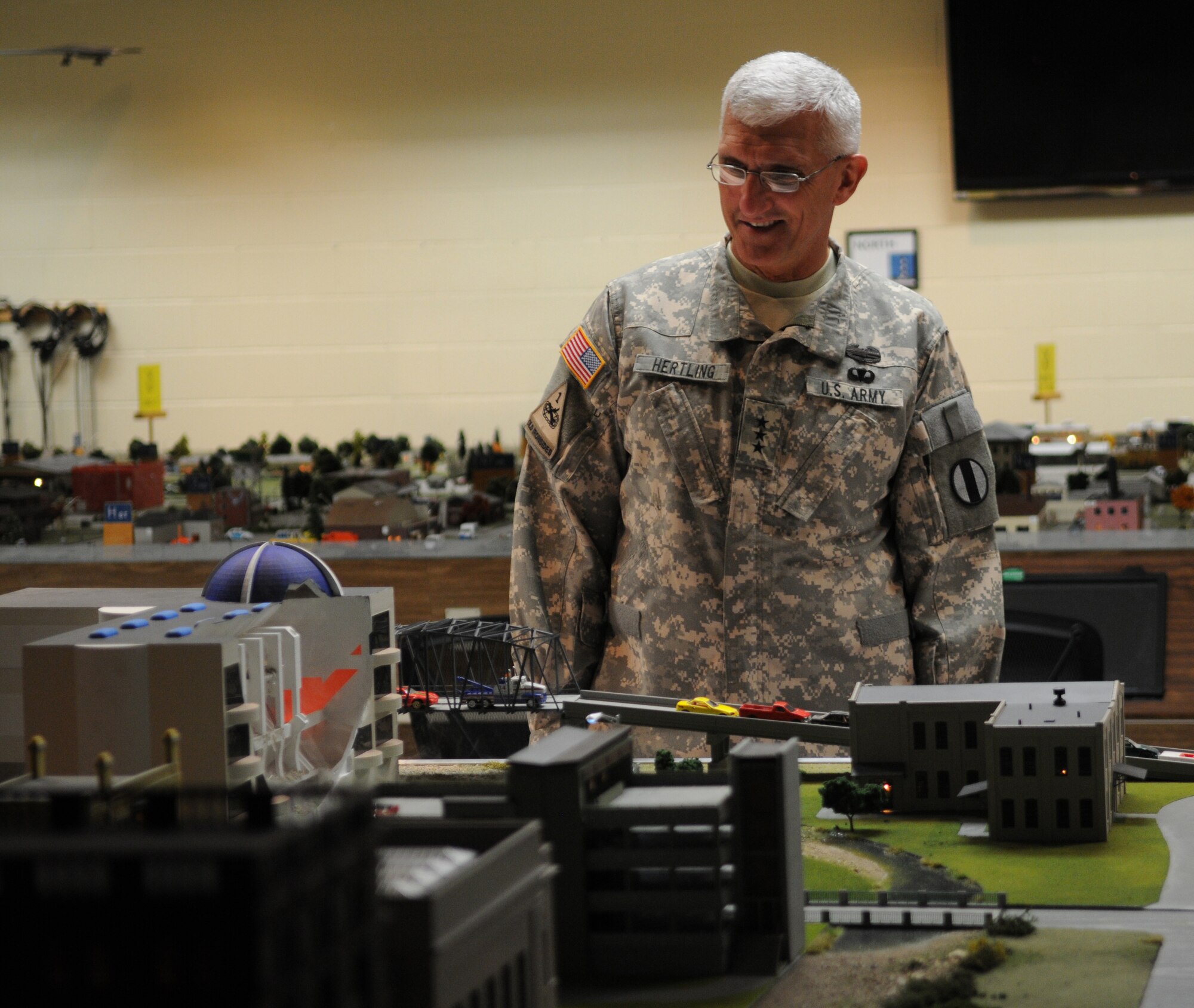 GOODFELLOW AIR FORCE BASE, Texas -- Lt. Gen. Mark Hertling examines the Command and Control simulator at the Louis F. Garland Department of Defense Fire Academy, March 4, 2010. General Hertling, Deputy Commanding General for Initial Military Training, U.S. Army Training and Doctrine Command, visited Goodfellow to observe training. (U.S. Air Force photo/Airman 1st Class Clayton Lenhardt)