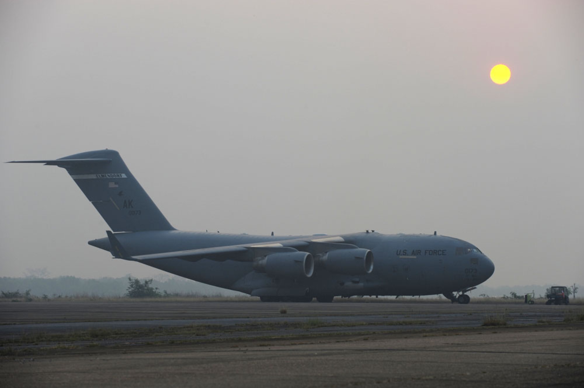 A U. S. Air Force C-17 Globemaster III from Elmendorf Air Force Base, Alaska is parked on the flightline of Udon Thani Royal Thai Air Force Base, Thailand as aircrew prepare to support exercise Cope Tiger 2010, March 8. Cope Tiger 2010 is an annual multilateral aerial large force exercise conducted in Thailand that includes humanitarian and civic assistance programs. This year's exercise takes place primarily at Udon Thani and Korat Royal Thai Air Force Bases March 1-12. (U.S.  Air Force photo/Tech Sgt. Cohen A. Young)