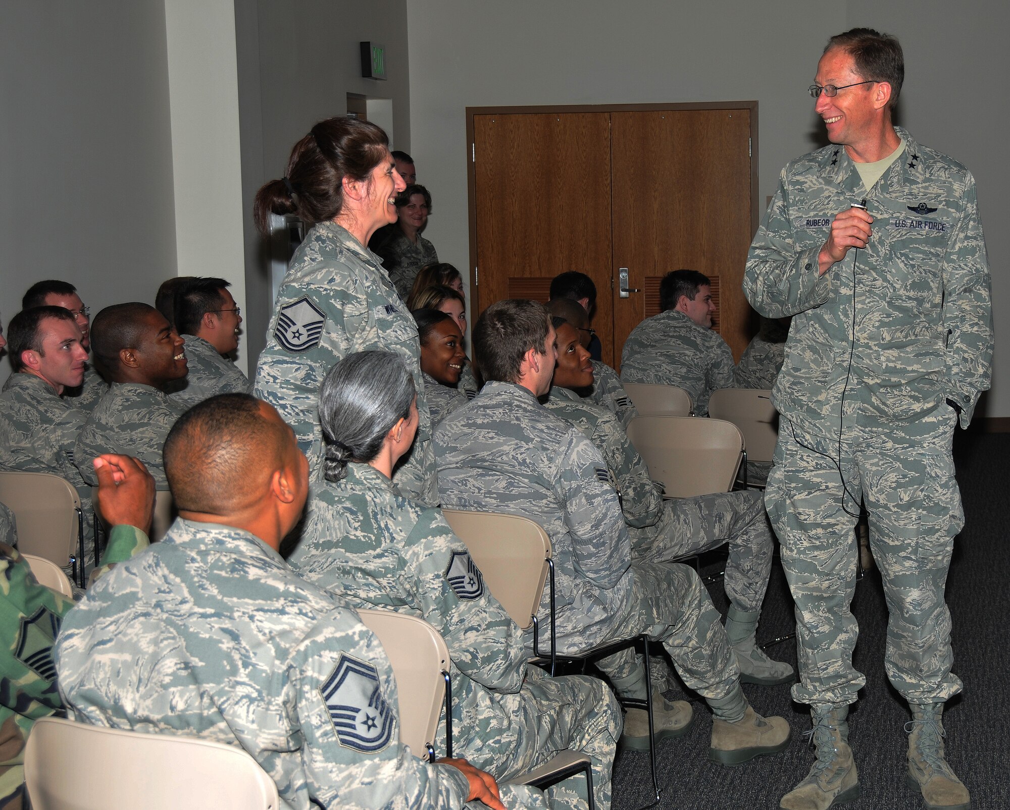 Maj. Gen. James Rubeor, 22nd Air Force commander, speaks with Master Sgt. Kathy Wheelock, 403rd Maintenance Operations Flight, during a wing call at the Roberts Maintenance Facility here on March 6, 2010. General Rubeor fielded questions from Sergeant Wheelock and others concerning Reservists' needs and the future of the 403rd Wing. (U.S. Air Force photo by Senior Airman Kimberly Erickson)