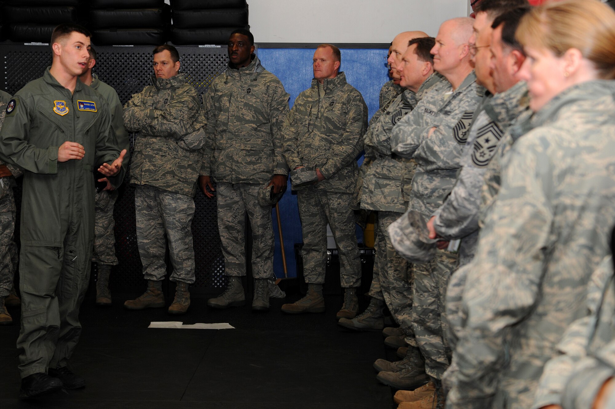 Tech. Sgt. James Chubb, U.S. Air Force Expeditionary Center 421st Combat Training School instructor, explains RAVEN combatives to a group of visiting Air Mobility Command Chief Master Sergeants March 3.  The command chiefs learned what type of training Security Forces Airmen endure to become a RAVEN. (U.S. Air Force Photo/Staff Sgt. Nathan G. Bevier)