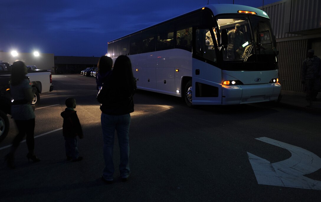 LANGLEY AIR FORCE BASE, Va. -- Families and friends wait for eight 633d Logistics Readiness Squadron Airmen and one Air Combat Command A4 Airman to return from their 200-day deployment March 5. The Airmen deployed as Air Force Combat Convoy Vehicle Operators in support of the 586th Expeditionary Logistics Readiness Squadron at Camp Arifjan, Kuwait . (U.S. Air Force photo/Airman Rebecca Montez)