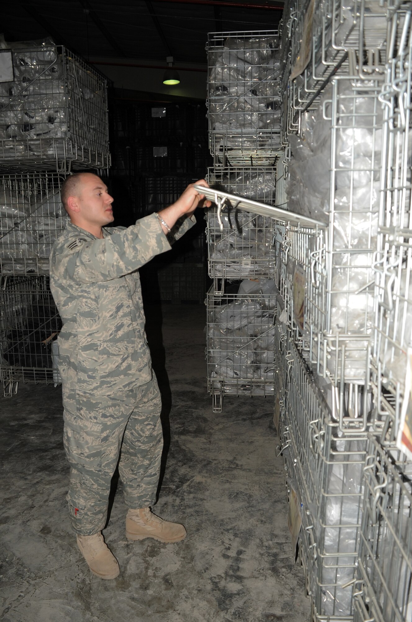 Senior Airman Aleksandr Dromov, a material management journeyman with the 380th Expeditionary Logistics Readiness Squadron, checks on stock inventory in his squadron's supply warehouse at a non-disclosed location in Southwest Asia on March 6, 2010. Airman Dromov is deployed from the 355th Logistics Readiness Squadron at Davis-Monthan Air Force Base, Ariz., and his current hometown is Memphis, Tenn.  He joined the Air Force shortly after Sept. 11 , 2001, and immigrated to the United States from Ukraine when he was 10 years old in 1995.  His deployed unit, as part of the 380th Air Expeditionary Wing, supports operations Iraqi Freedom and Enduring Freedom and the Combined Joint Task Force-Horn of Africa.  (U.S. Air Force Photo/Master Sgt. Scott T. Sturkol/Released)