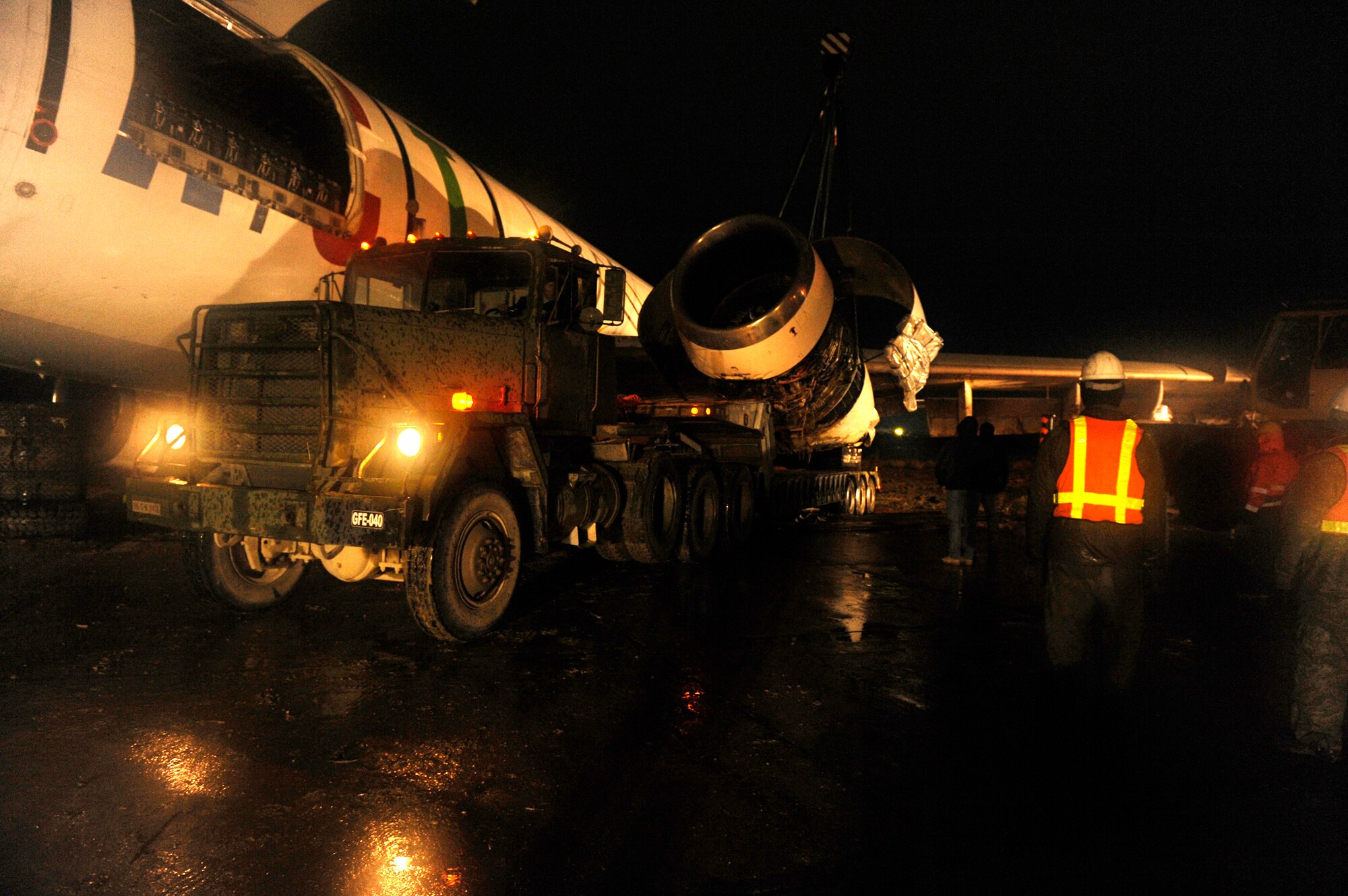 Airmen, Soldiers and contractors move an Airbus A300 after its crew preformed an emergency  landing March 3, 2010, at Bagram Airfield, Afghanistan. (U.S. Air Force photo by/Tech. Sgt. Jeromy K. Cross)