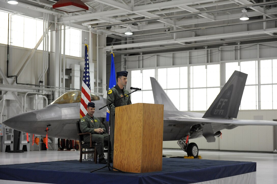 LANGLEY AIR FORCE BASE, Va. -- Lt. Col. Pete Fesler, new 27th Fighter Squadron commander, addresses his squadron during the change-of-command ceremony March 5 in the 27 FS hangar.  Lt. Col. Lansing Pilch relinquished command to Colonel Fesler after serving nearly two years as commander.  (U.S. Air Force photo/Senior Airman Zachary Wolf)
