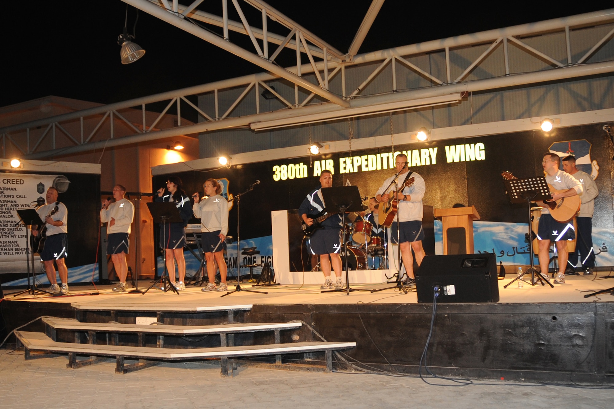 Members of the 380th Air Expeditionary Wing chapel contemporary worship service praise band, perform during the "Gospel Explosion" at an undisclosed location in Southwest Asia on March 6, 2010. Members of various worship services musical groups joined together for a concert with special guest (Ch.) Maj. Gen. Cecil Richardson, Air Force Chief of Chaplains, speaking. The 380th AEW, supports Operations Iraqi Freedom and Enduring Freedom and the Combined Joint Task Force-Horn of Africa. The 380th AEW is comprised of four groups and 12 squadrons and the wing's deployed mission includes air refueling, surveillance and reconnaissance in support of overseas contingency operations in Southwest Asia. (U.S. Air Force photo/Senior Airman Jenifer H. Calhoun/Released)