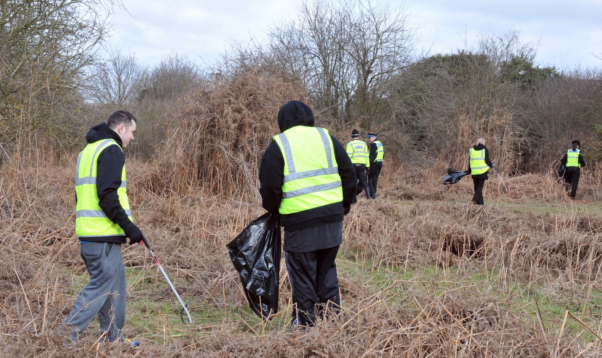 RAF MILDENHALL, England – More than 30 RAF Mildenhall volunteers helped the Red Lodge community March 6 as part of a wildlife cleanup effort sanctioned by the Forest Heath District Council and the Red Lodge Conservation Group. The Airmen joined Red Lodge villagers and about 10 local constables to undertake the restoration efforts. (U.S. Air Force photo/Tech. Sgt. Kevin Wallace)