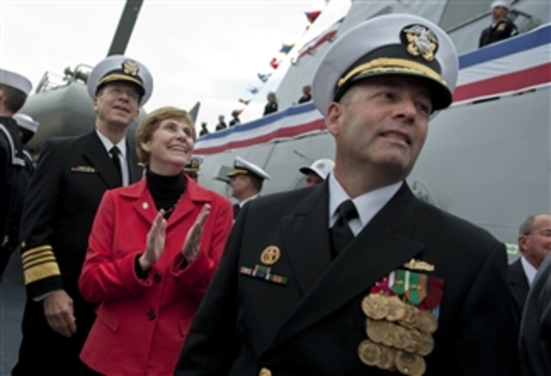 Chairman of the Joint Chiefs of Staff Adm. Mike Mullen, U.S Navy, his wife Deborah, USS Dewey (DDG105) ships sponsor and Cmdr. Warren R. Buller, commanding officer, USS Dewey watch the crew bring the ship to life at the commissioning ceremony for U.S. Navy's newest Arleigh Burke-class guided missile destroyer at Seal Beach Naval Weapons Station, Calif., on March 6, 2010.  