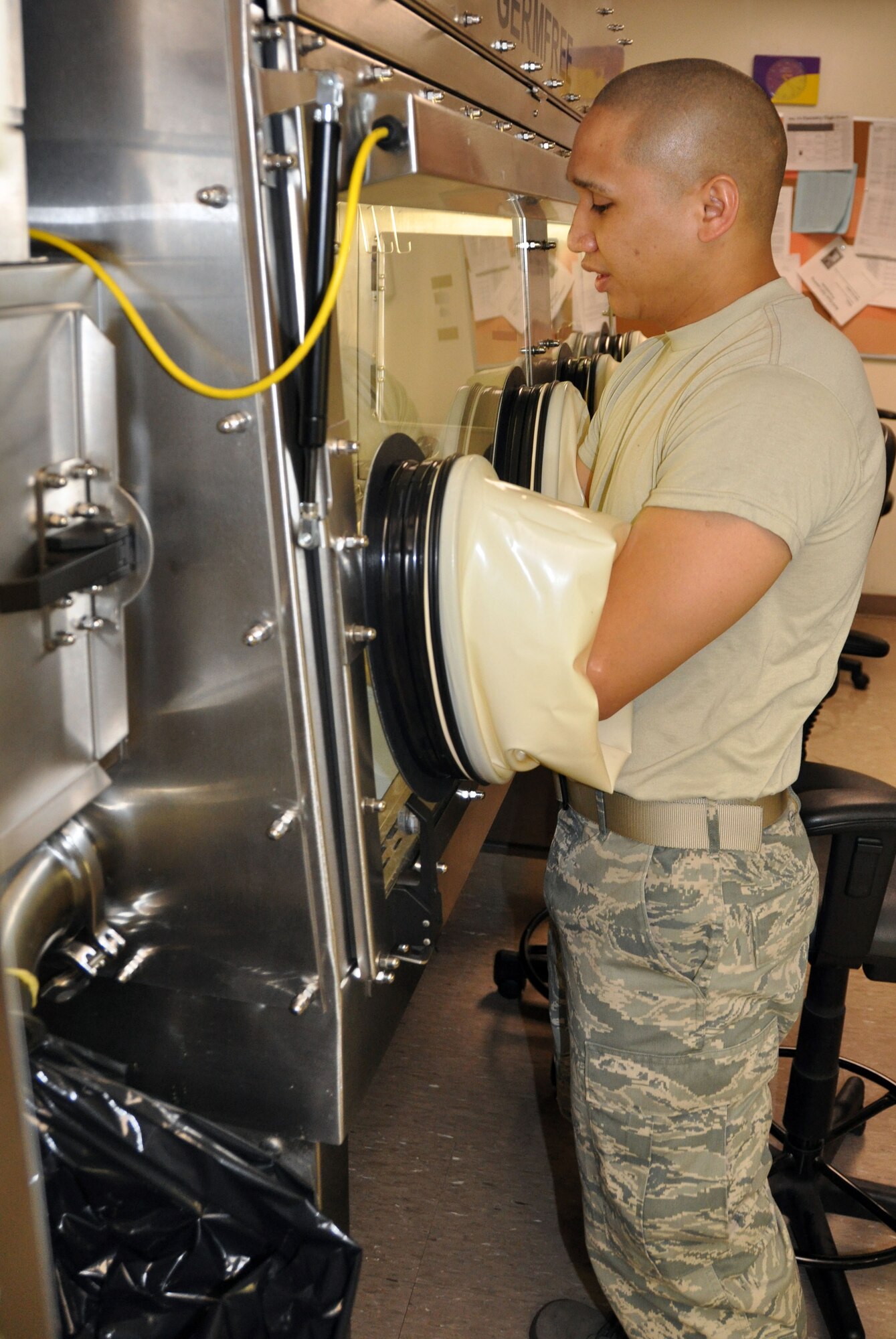 Airman 1st Class Leonard Portillo, 60th Medical Diagnostic Therapeutic Squadron inpatient pharmacy technician makes medical I.V prescriptions under clean room conditions March 9. U.S. Air Force photo/Amn. Michael Battles