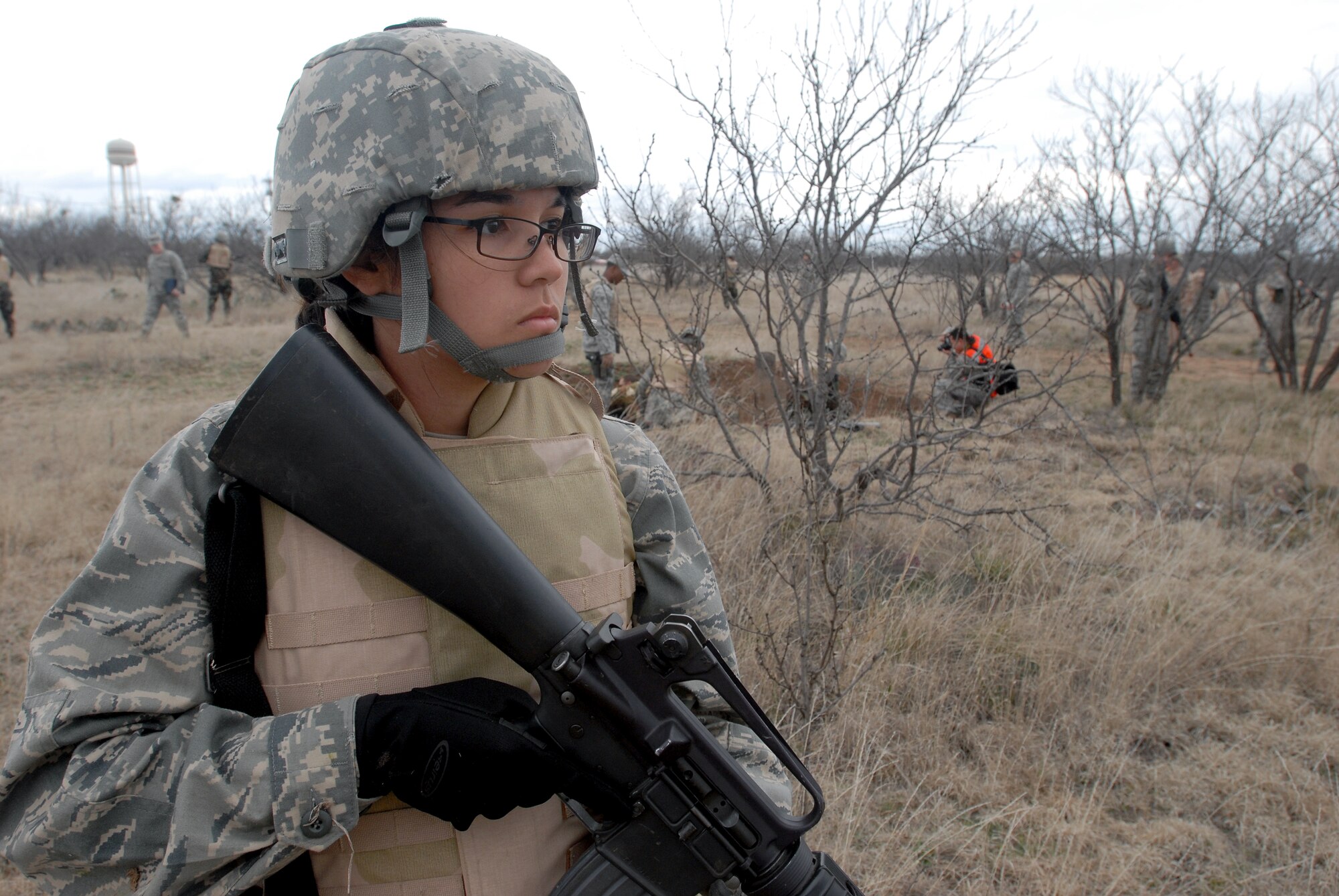 GOODFELLOW AIR FORCE BASE, Texas - Cadet Angelie Wanner, a member of the Air Force Reserve Officer Training Corps Detachment 847, Angelo State University, San Angelo, Texas, provides security for her unit after they were attacked while on patrol, March 6, 2010.  The 17th Training Wing hosted cadets for 2 days during which cadets participated in class room instruction, field training and a deployment exercise at Goodfellow’s Forward Operating Base Sentinel. (U.S. Air Force photo/Master Sgt Randy Mallard)