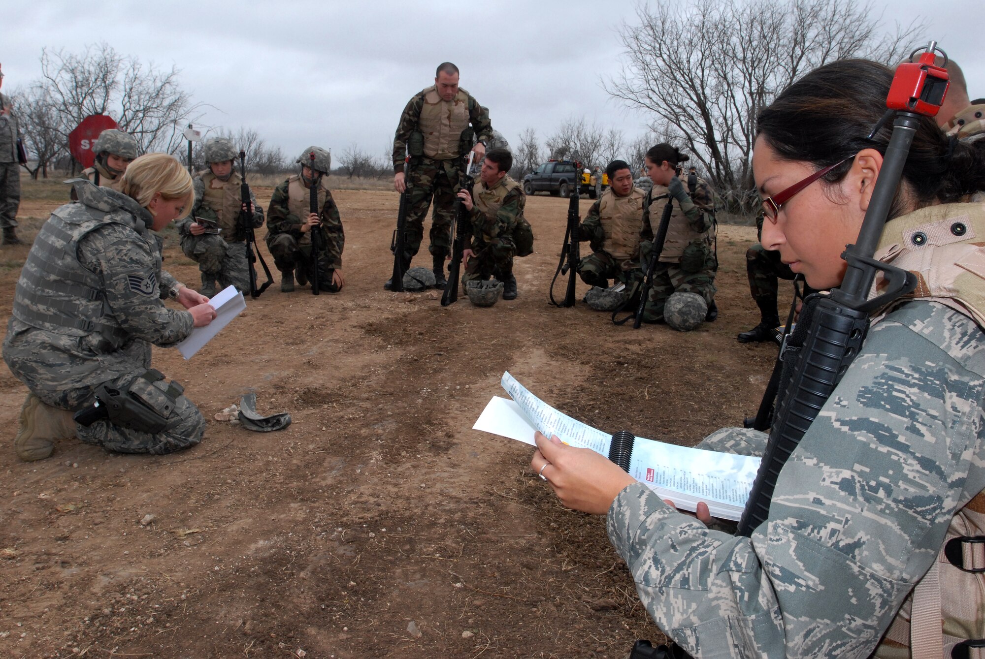 GOODFELLOW AIR FORCE BASE, Texas - Staff Sgt. DeAndra Vertrees, a member of the 17th Security Forces Squadron, Goodfellow AFB, Texas, prepares to instruct cadets from Air Force Reserve Officer Training Corps Detachment 847, Angelo State University, San Angelo, Texas, on how to react to hostile fire prior to an actual field exercise, March 6, 2010. The 17th Training Wing hosted cadets for 2 days during which cadets participated in class room instruction, field training and a deployment exercise at Goodfellow AFB’s Forward Operating Base Sentinel. (U.S. Air Force photo/Master Sgt Randy Mallard)
