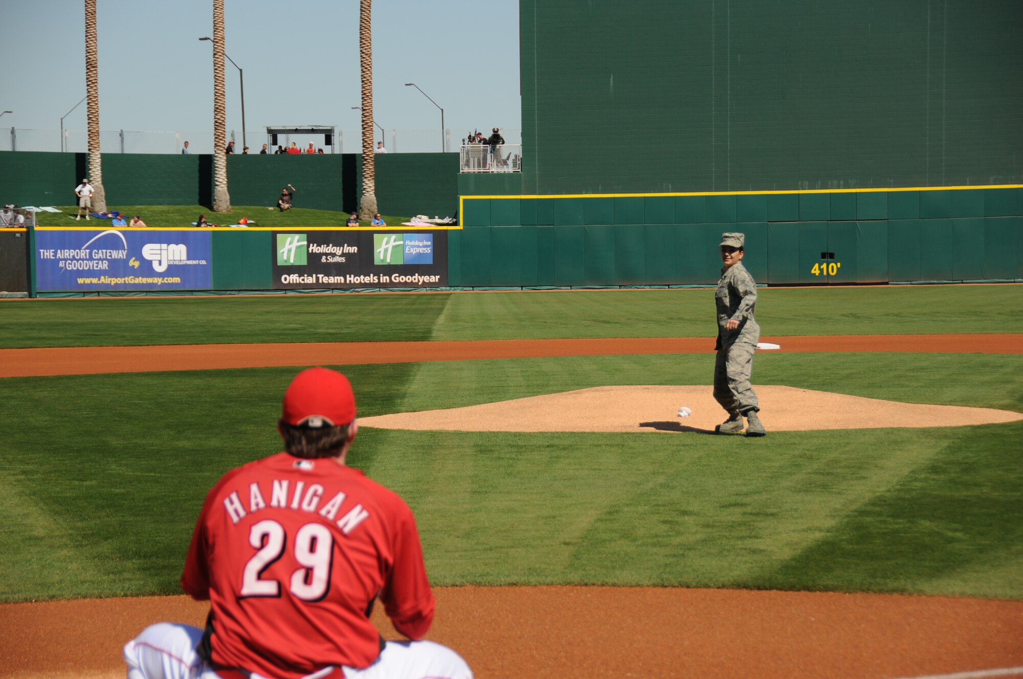 Senior Airman Nicole Lougheed, a reservist with the 944th Aeromedical
Staging Squadron, throws out the ceremonial first pitch March 5 during
opening day at Goodyear Ballpark. The Cincinnati Reds took on the Cleveland
Indians to kick off their Cactus League Spring Training 2010 season. Opening
day was also Military Appreciation Day where all branches of service were
recognized for efforts both at home and overseas. Tech. Sgt. Michelle
Schoenfeld, 944th Fighter Wing Equal Opportunity Office, sang the National
Anthem as a four-ship of F-16s from the 310th Fighter Squadron flew
overhead. The Marine Corps provided the color guard and the Air Force
Reserve recruiters were on hand to tell about opportunities in the military.
(U.S. Air Force photo/Tech. Sgt. Susan Stout)
