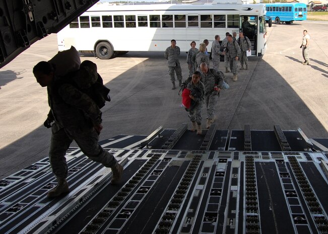 (Photo by Steve Pivnick)
The 81st Medical Group team boards the C-17 “Globemaster III” aircraft from the 437th Airlift Wing at Charleston AFB, S.C., that was to transport them to San Antonio en route to Chile.  Senior base leadership, including 2nd Air Force Commander Maj. Gen. Mary Kay Hertog, 81st TRW Vice Commander Col. Christopher Valle, 81st TRW Command Chief Master Sgt. Lonnie Slater, 81st MDG Commander Brig. Gen. (Dr.) Dan Wyman and 81st MDG Superintendent Chief Master Sgt. Michael Anderson, was on hand to personally wish each team member a safe and successful mission.   The aircraft departed shortly after 3 p.m.  The same C-17 was expected to transport the combined Keesler AFB-Lackland AFB team to Chile.