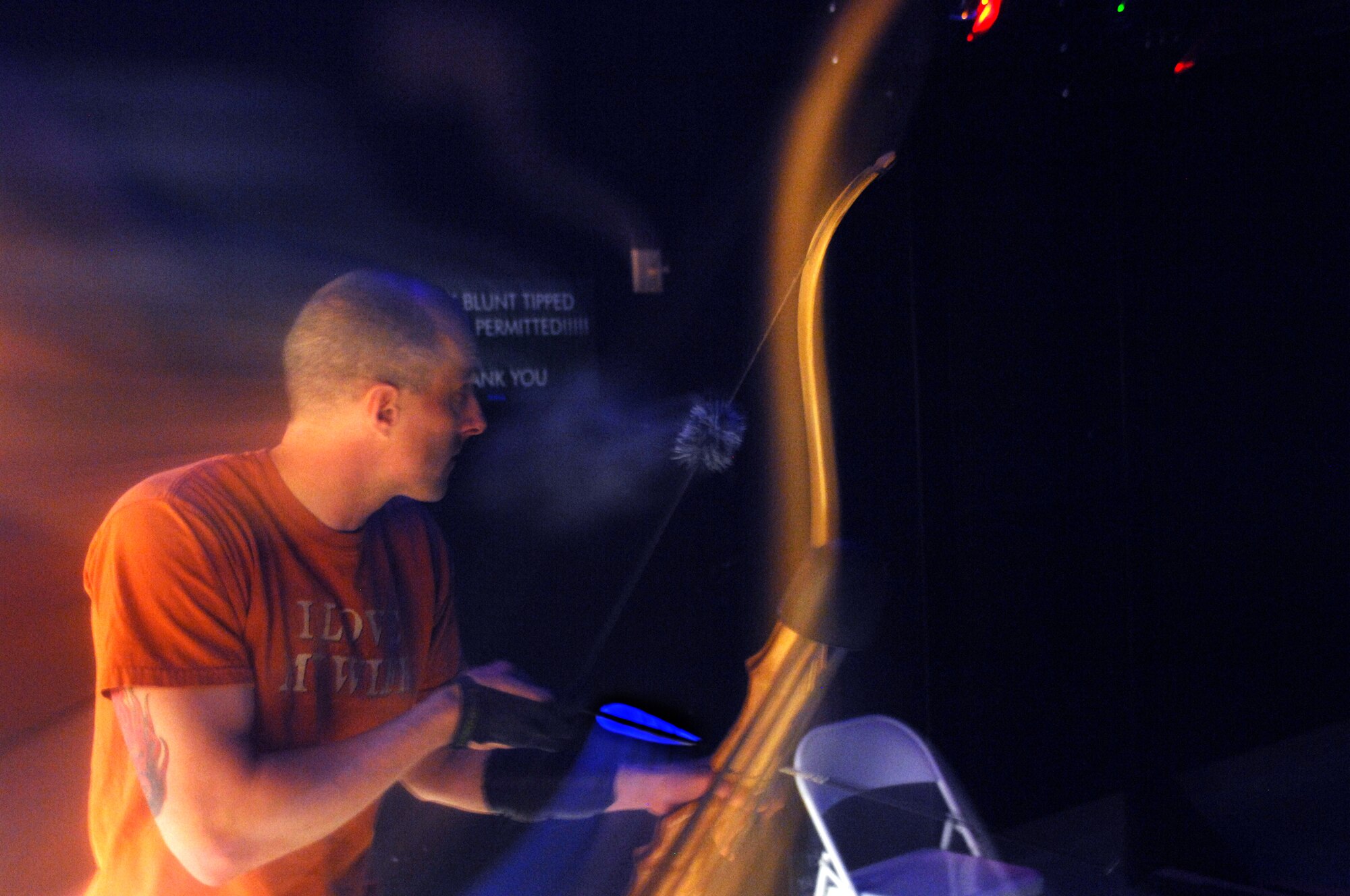 MINOT AIR FORCE BASE N.D. – Tech. Sgt. Thomas Dow, 5th Bomb Wing public affairs web editor, practices archery with his bow at the archery simulator range at Minot Air Force Base March 8. The outdoor recreation center received the virtual range last September and is currently holding a league competition which began March 1.  The nine-week league will conclude April 24, with a trophy going to the top two-person team. The outdoor recreation center is open from 10 a.m. to 5 p.m. on Monday, Tuesday, Thursday and Friday and 10 a.m. to 2 p.m. on Saturday. (U.S. Air Force photo by Airman 1st Class Aaron-Forrest Wainwright)