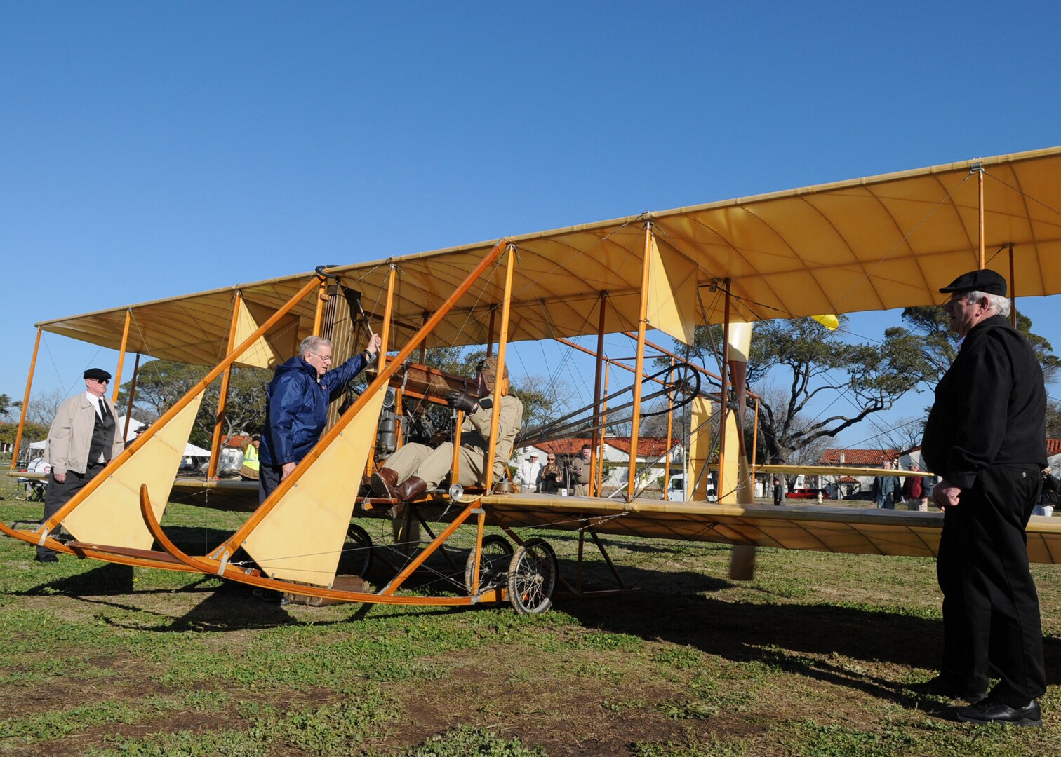 Pilot Don Gum is at the controls of a Wright Flyer "Yellow Bird" prior to a powered taxi on the parade grounds of Fort Sam Houston, Texas. The March 2 display marked the 100th Anniversary of Military Aviation. On March 2, 1910 Army Lt. Benjamin Foulois took off in a Wright Flyer, from the same parade ground, on the first military flight. (U.S. Air Force photo by Dave Terry)