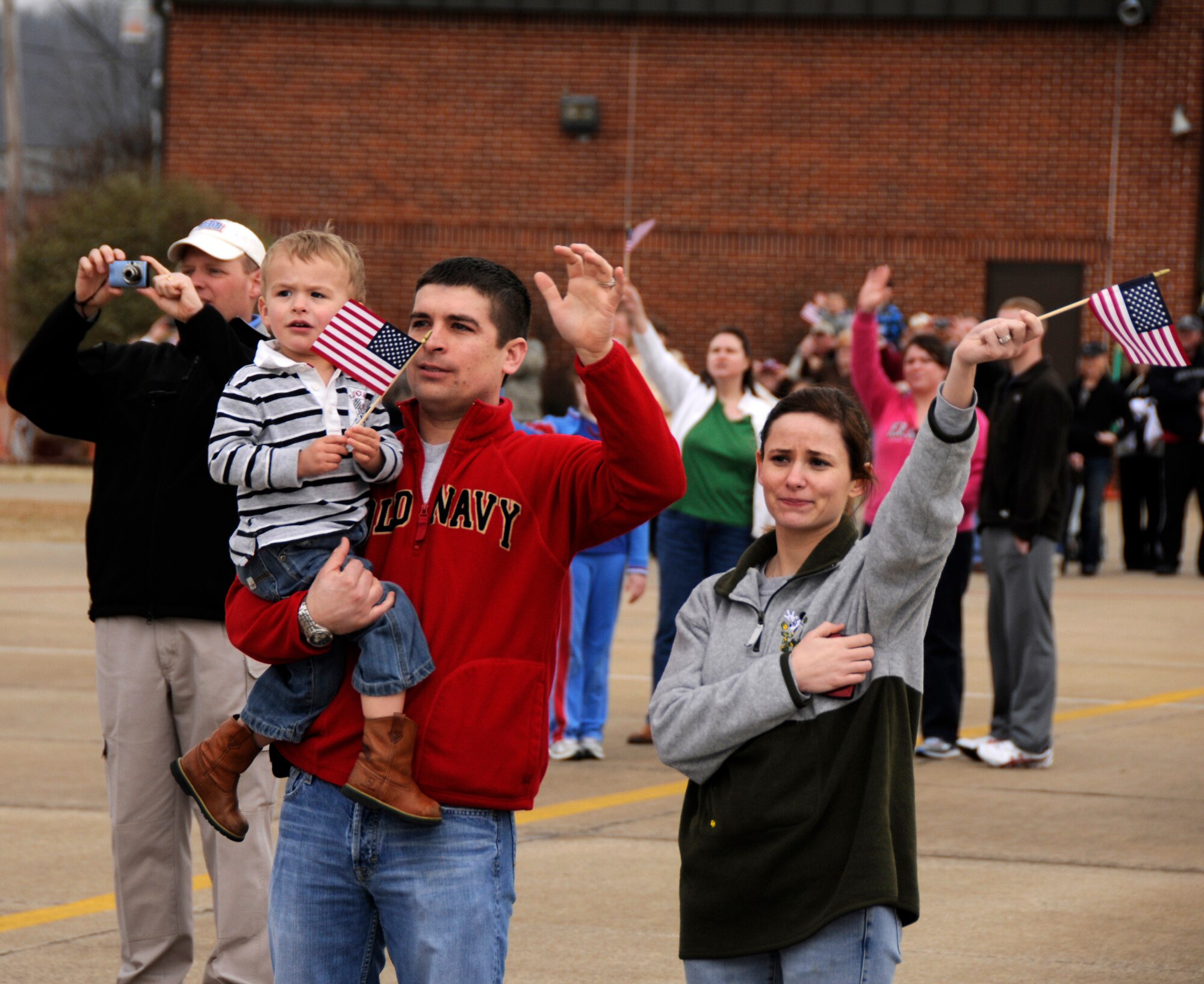 Family and friends of members of the 188th Fighter Wing wave goodbye as a McDonnell Douglas DC-10 with more than 200 Airmen on board takes off at the Fort Smith (Ark.) Regional Airport March 8, 2010. The 188th will be deployed for more than two months to Kandahar, Afghanistan, as part of the unit's Aerospace Expeditionary Forces rotation. This will mark the 188th's first combat deployment in the A-10 Thunderbolt II "Warthog." (U.S. Air Force photo by Technical Sgt Stephen M. Hornsey/188th Fighter Wing Public Affairs) 