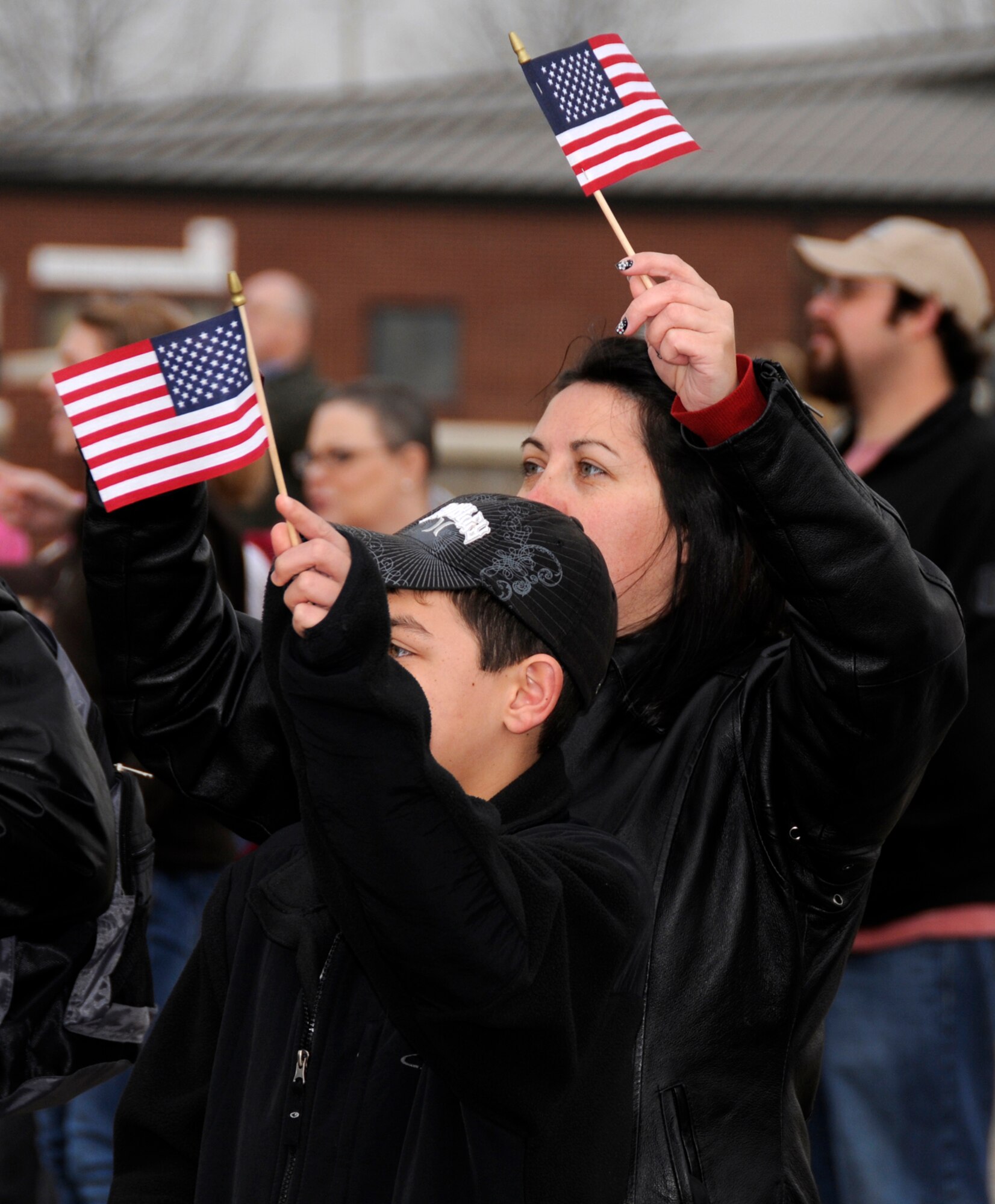 Family and friends of members of the 188th Fighter Wing wave goodbye as a McDonnell Douglas DC-10 with more than 200 Airmen on board takes off at the Fort Smith (Ark.) Regional Airport March 8, 2010. The 188th will be deployed for more than two months to Kandahar, Afghanistan, as part of the unit's Aerospace Expeditionary Forces rotation. This will mark the 188th's first combat deployment in the A-10 Thunderbolt II "Warthog." (U.S. Air Force photo by Technical Sgt. Stephen M. Hornsey/188th Fighter Wing Public Affairs) 