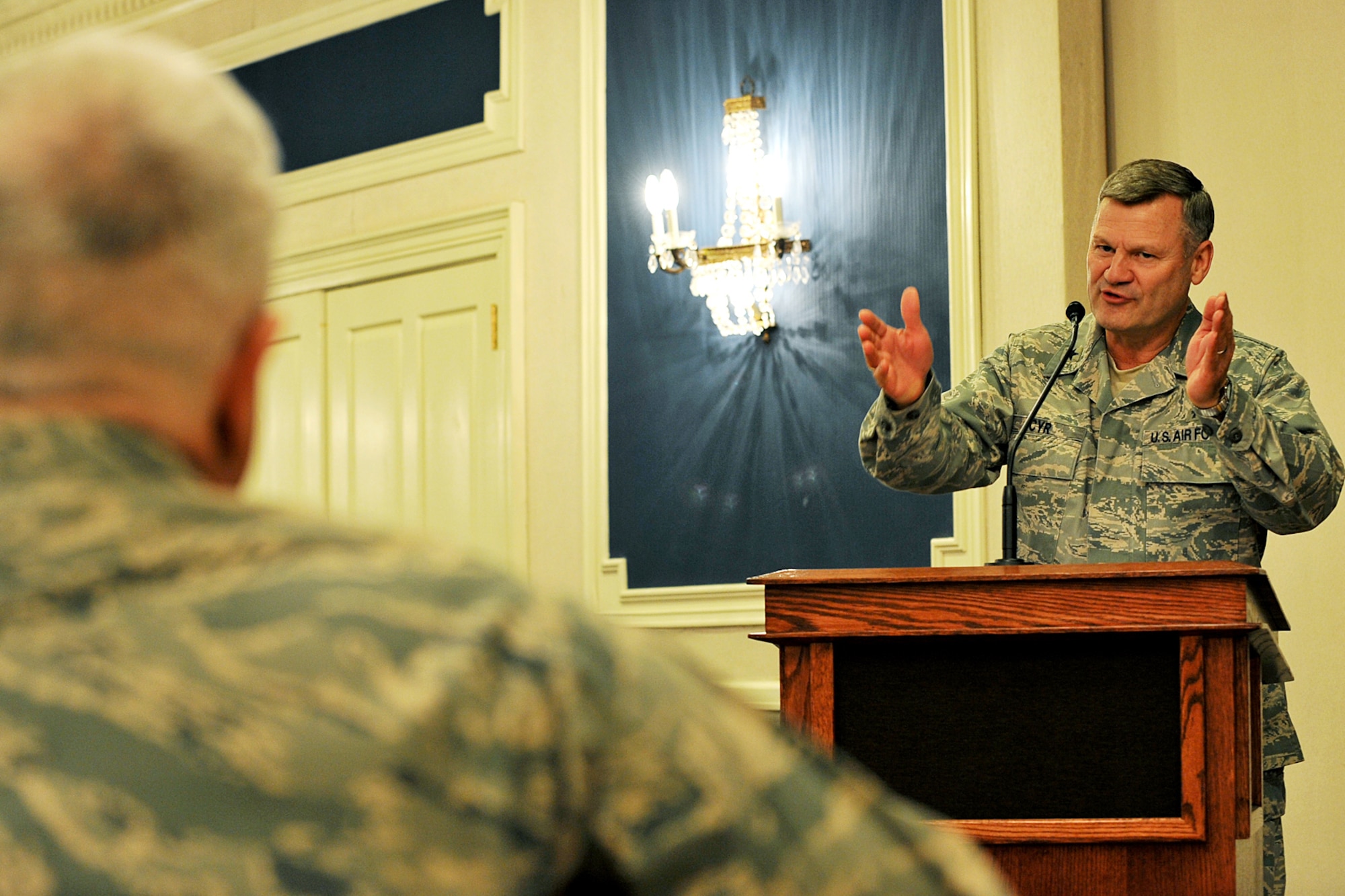 OFFUTT AIR FORCE BASE, Neb. -- Brig. Gen. David H. Cyr, Air Force deputy chief of chaplains, speaks about the importance of spiritual wellness during the National Prayer Luncheon at the Patriot Club here March 3. Throughout the event many of Offutt's personnel representing different faiths and backgrounds came together to pray for the warriors fighting for America, as well as their families. U.S. Air Force photo by Charles Haymond