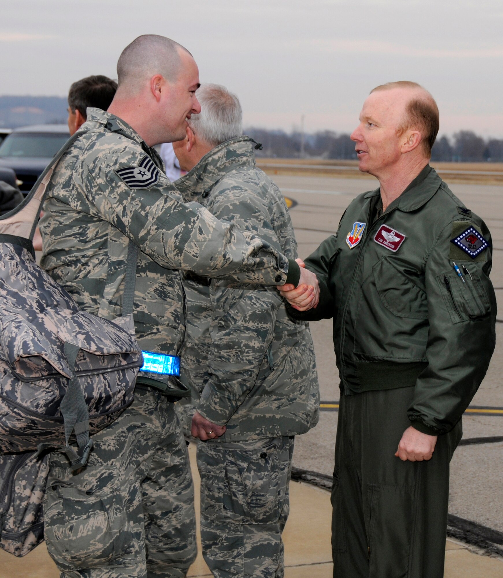 Col. Tom Anderson, 188th Fighter Wing commander, shakes hands with members of the 188th Fighter Wing March 8, 2010, in Fort Smith, Ark. The 188th deployed more than 200 Airmen to Kandahar, Afghanistan as part of the unit's Aerospace Expeditionary Forces rotation. This will mark the 188th's first combat deployment in the A-10 Thunderbolt II "Warthog." (U.S. Air Force photo by Tech Sgt. Stephen Hornsey/188th Fighter Wing Public Affairs)