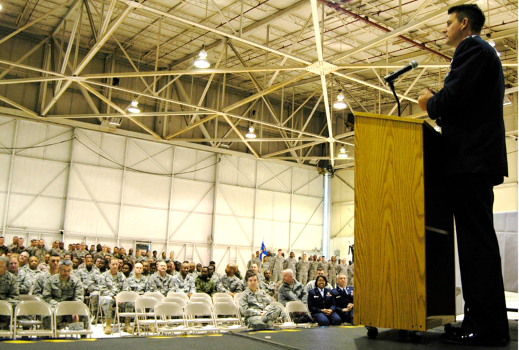 Col. Heath J. Nuckolls, commander, 94th Airlift Wing, informs attendees of recent achievements and upcoming changes at the wing commander’s call March 6. (U.S. Air Force photo/Airman 1st Class Chelsea Gitzen)