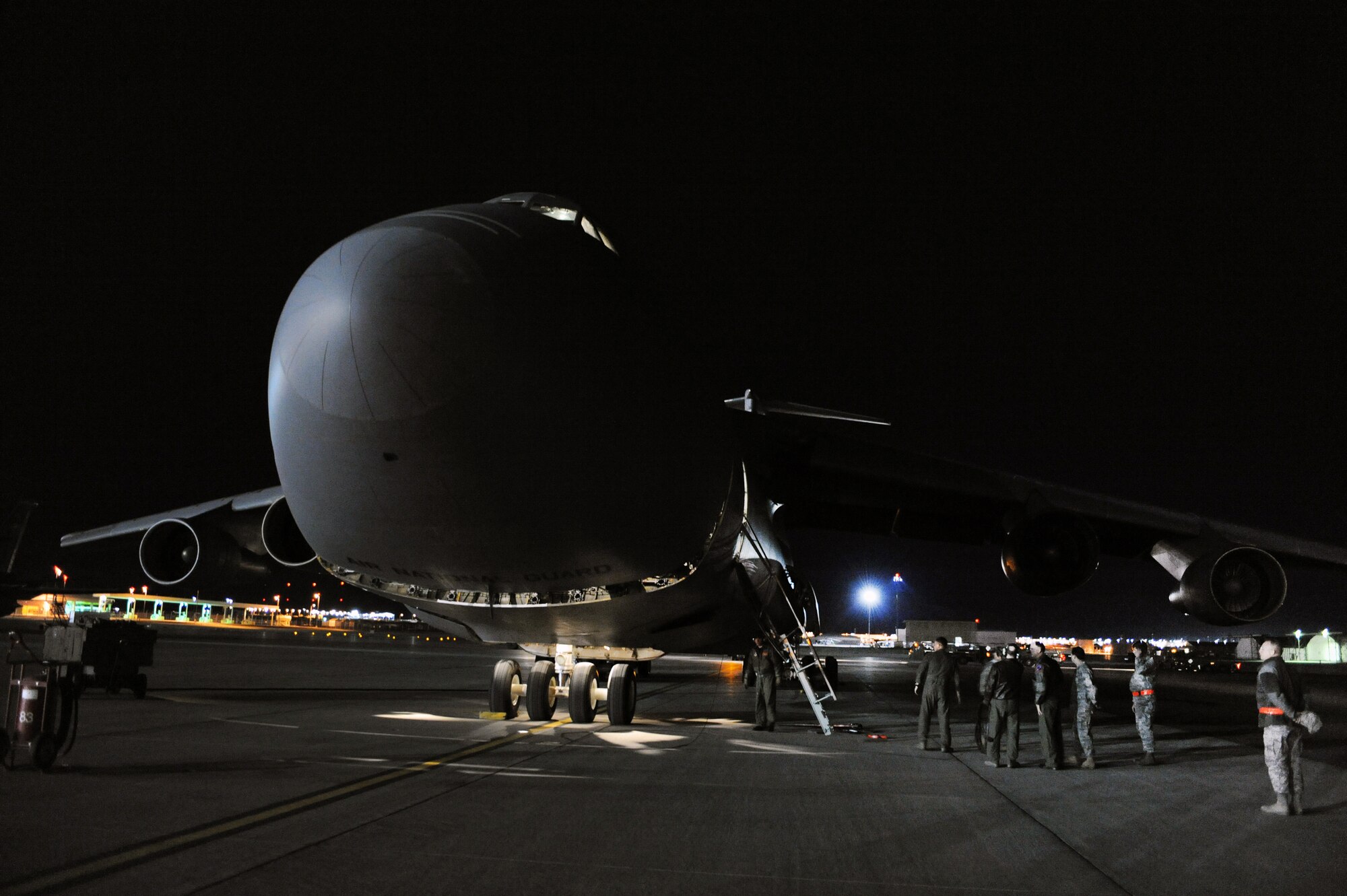 NELLIS AIR FORCE BASE, Nev -- Airmen from the 432d Wing returned home March 5, after supporting Operation United Response from Rafael Hernandez Airport in Puerto Rico since January 2010. Approximately 50 Airmen from the 432d Wing were deployed to provide real time full motion video to help relief officials direct resources on the ground in Haiti. (U.S. Air Force photo by Tech. Sgt. Michael R. Holzworth)